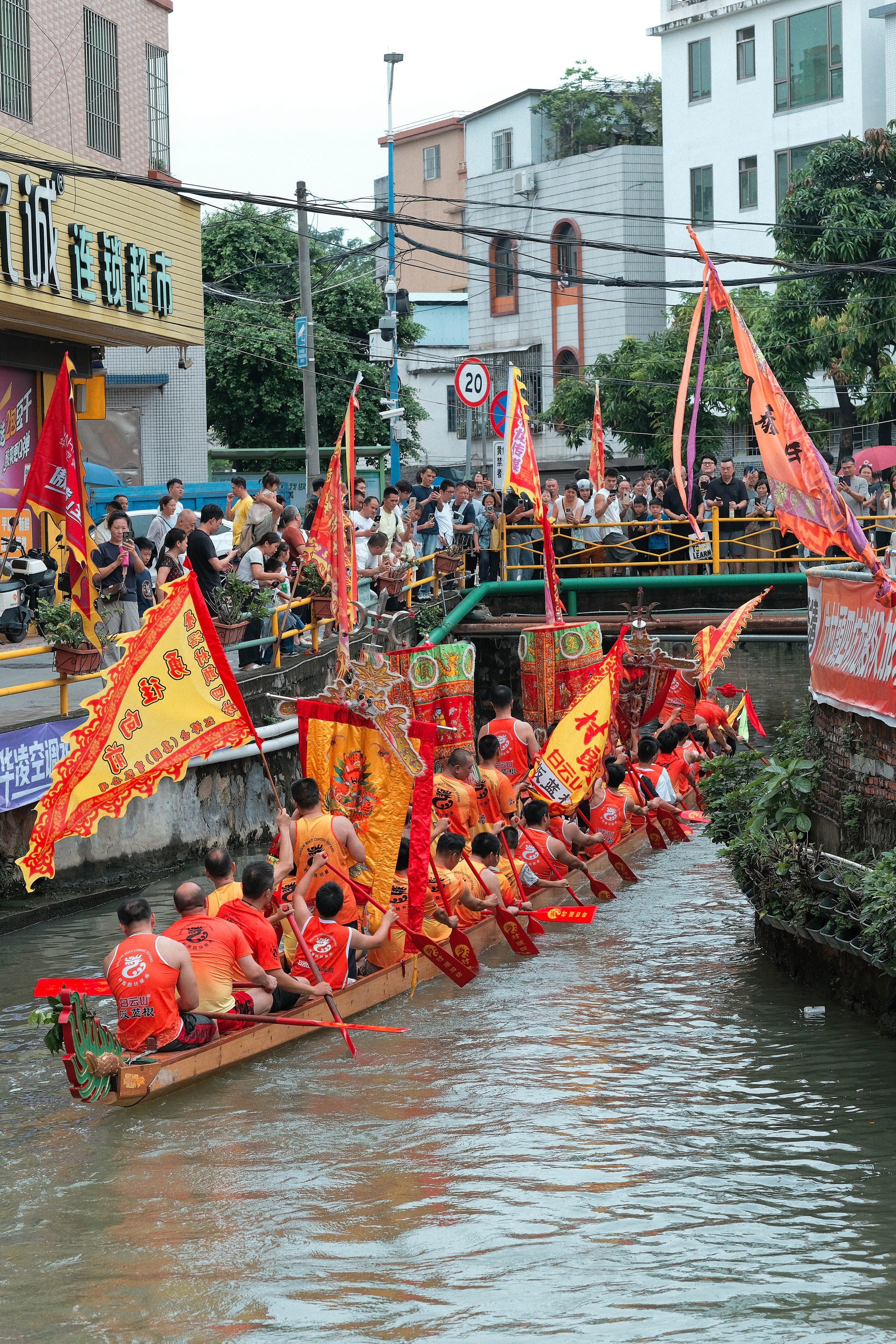 Dragon Boat Festival Foshan China photography showing traditional dragon boat races, rowing teams, local culture, and spectators during the annual Duanwu Festival in Guangdong Province.
