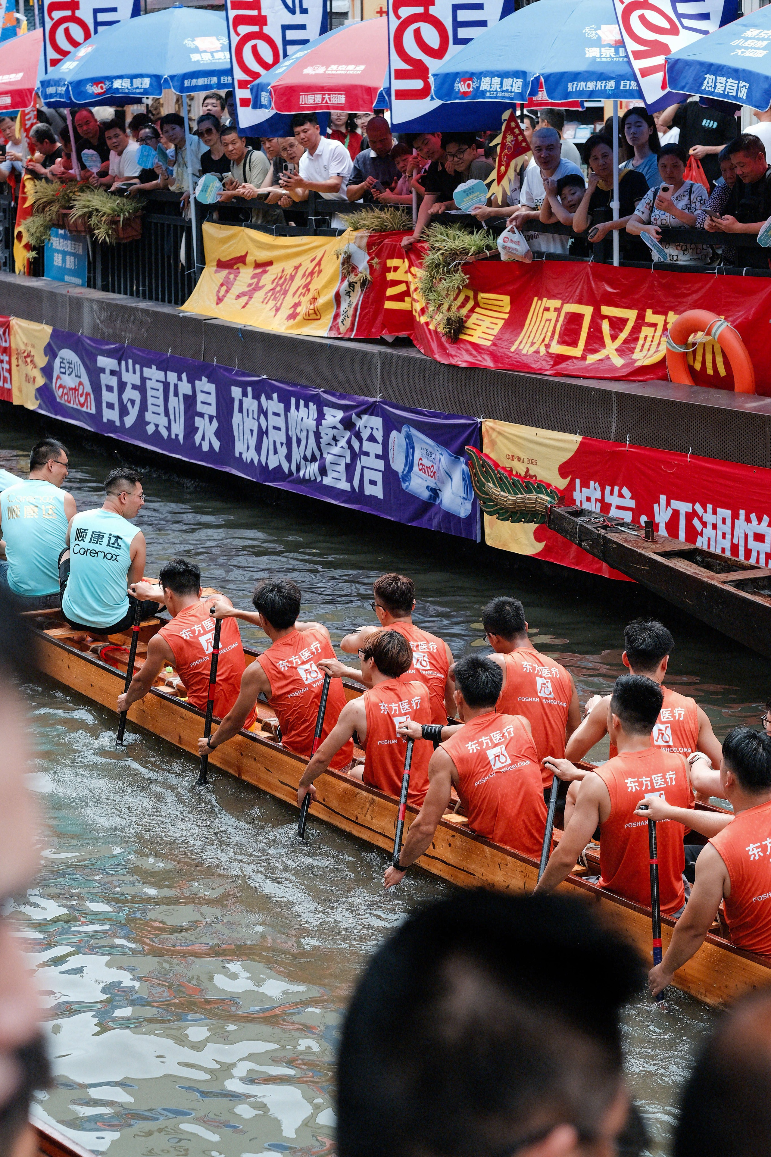 Dragon Boat Festival Foshan China photography showing traditional dragon boat races, rowing teams, local culture, and spectators during the annual Duanwu Festival in Guangdong Province.