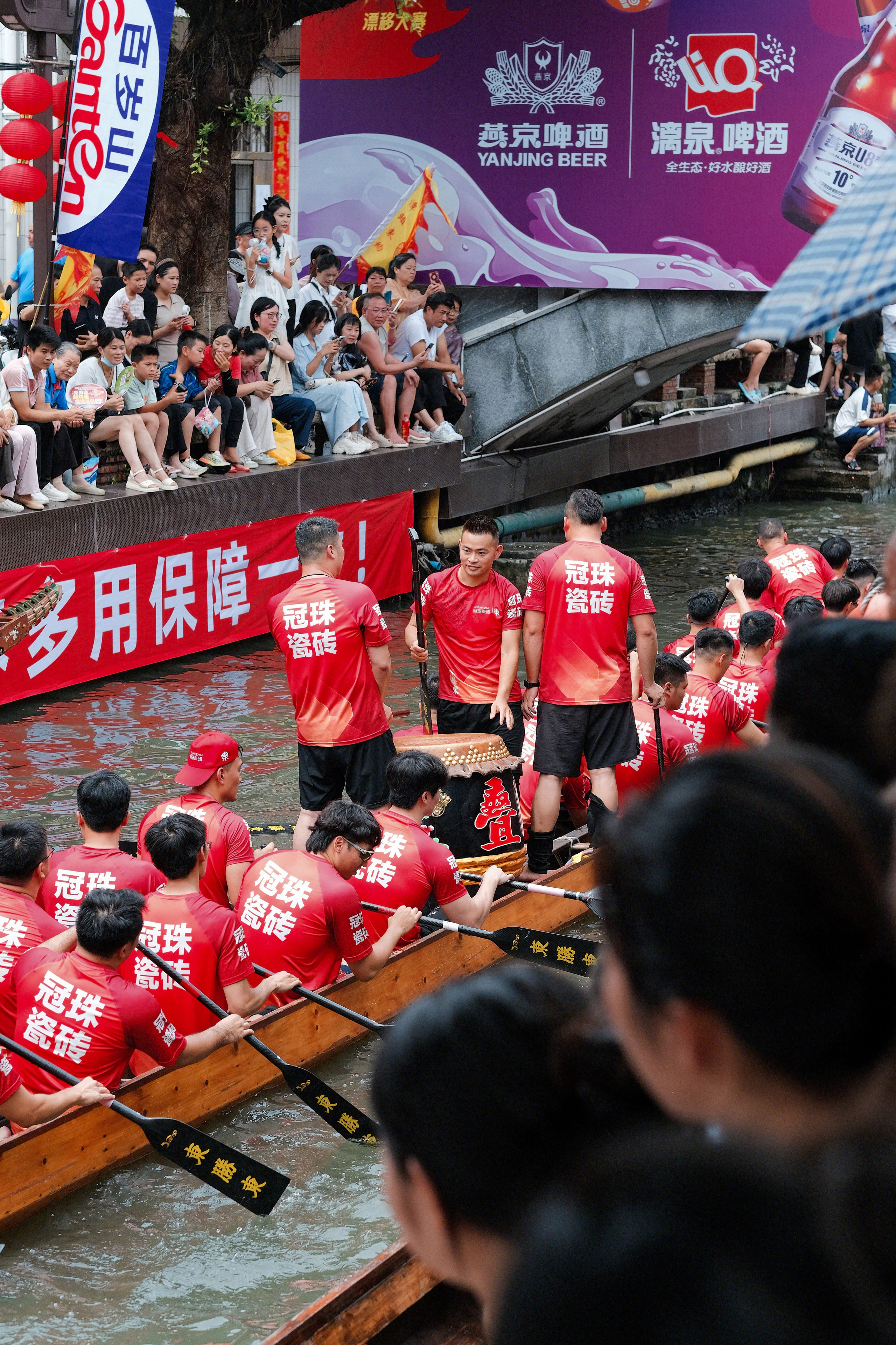 Dragon Boat Festival Foshan China photography showing traditional dragon boat races, rowing teams, local culture, and spectators during the annual Duanwu Festival in Guangdong Province.