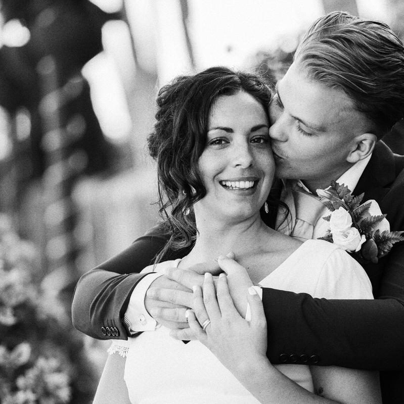 Gran Canaria Love Story Photographer A black-and-white photo of a bride and groom hugging