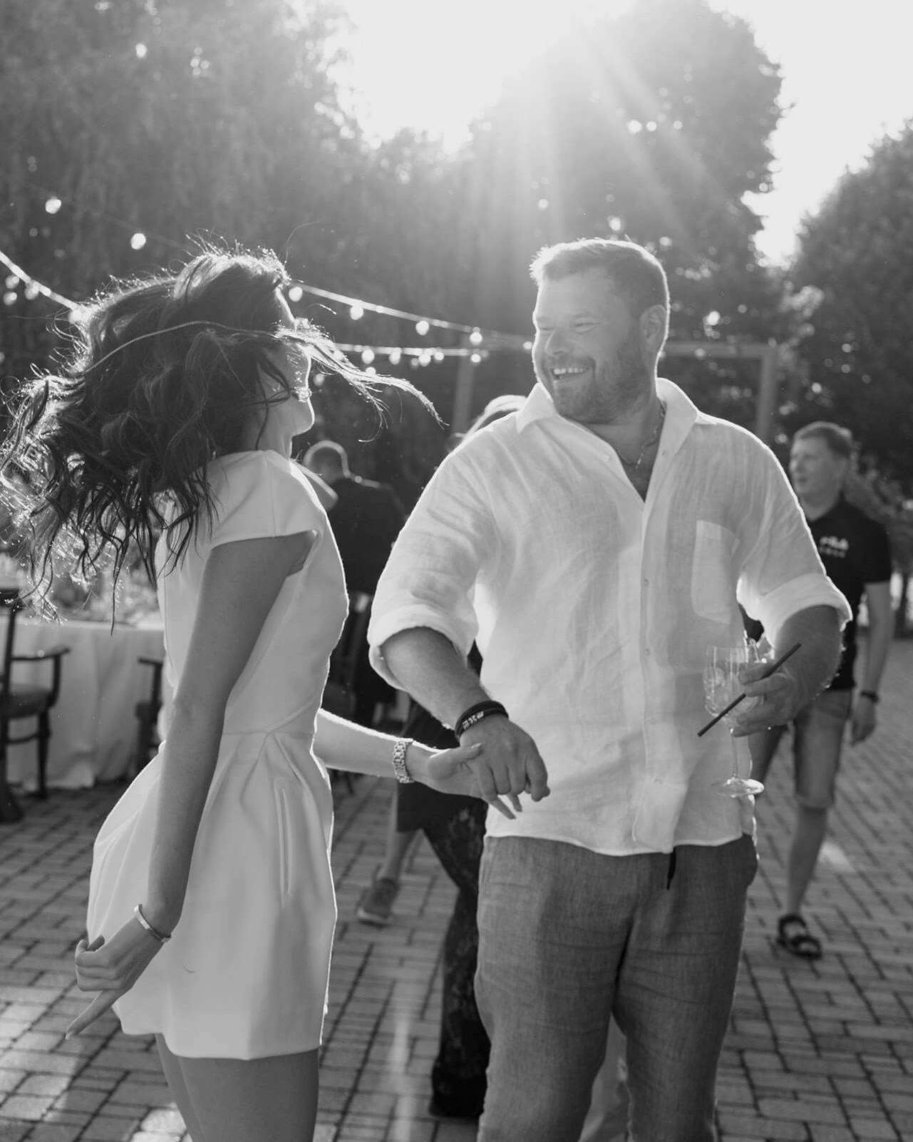 Couple dancing together at a wedding celebration in the Piedmont countryside