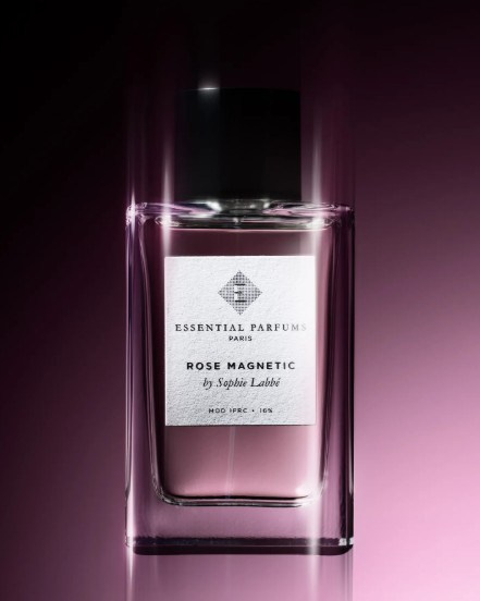 Violet perfume bottle under cinematic lighting — premium fragrance photography for brands.