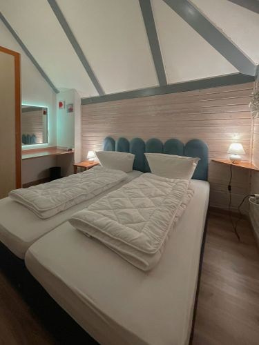 Schlafzimmer Erdgeschoss, 2 Einzelbeten / oder 1 Doppelbett 