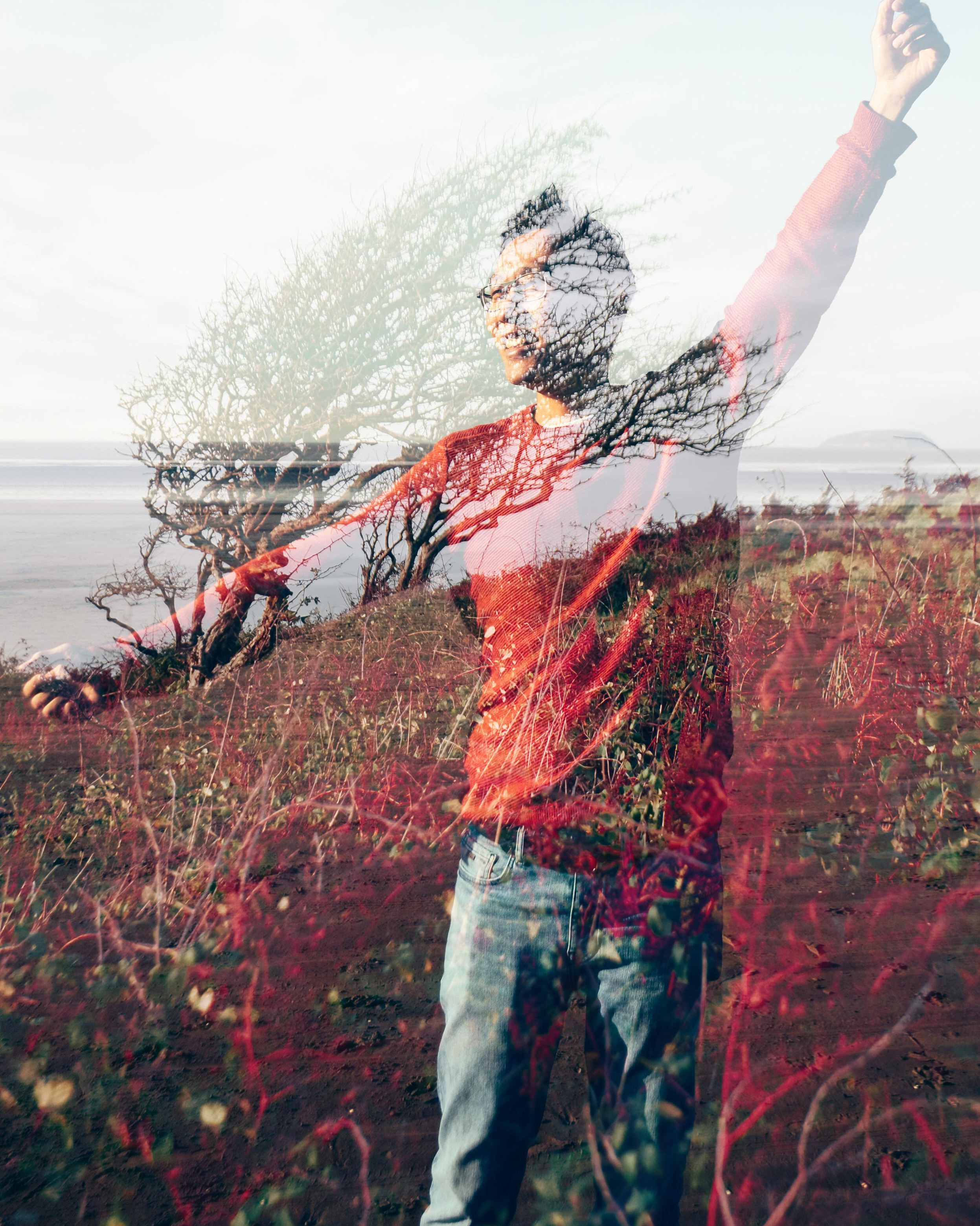 The man in red is in touch with nature. Individual artistic photo session.