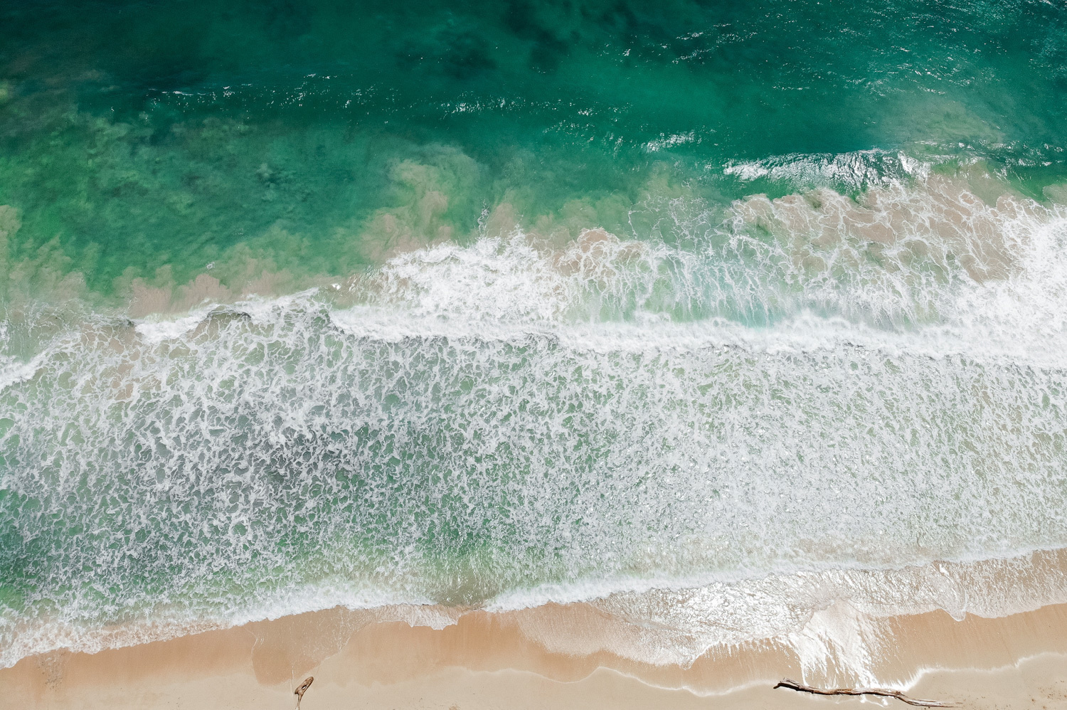 A picture of ocean waves from the air.