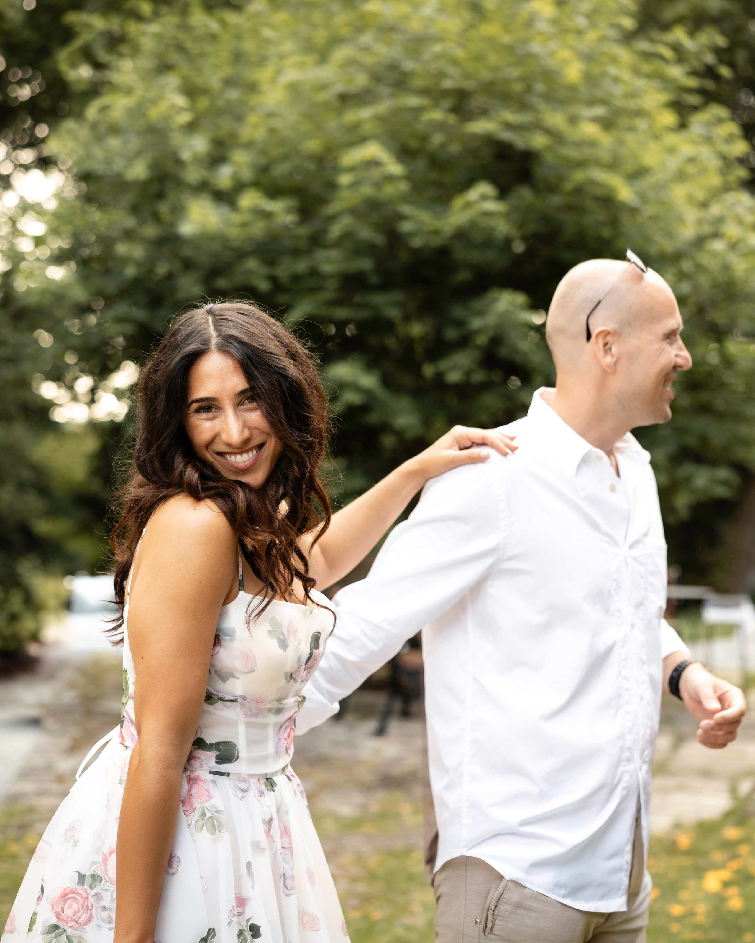smiling couple during a welcome dinner before a destination wedding in France