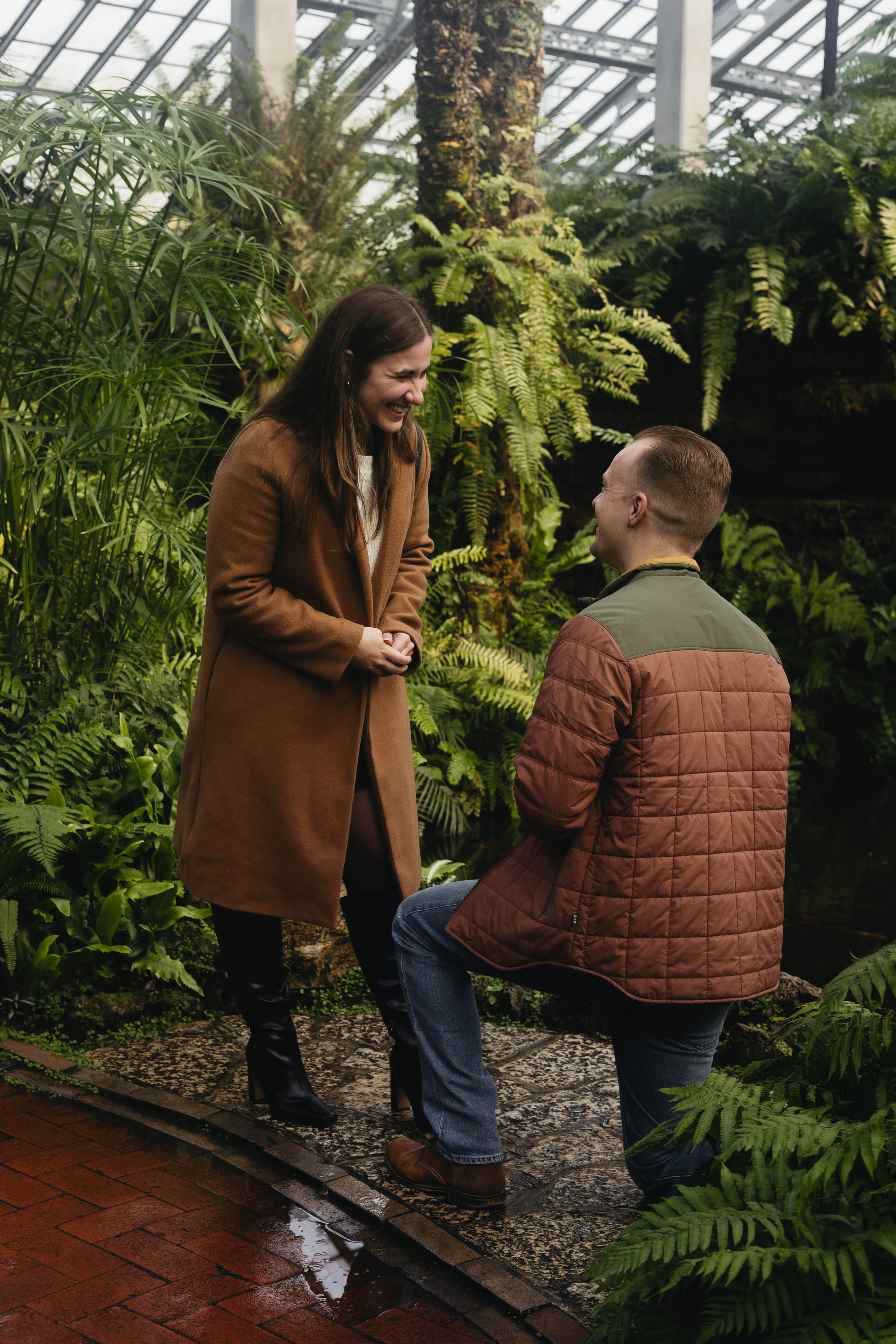 Couple during proposal at Garfield Park Conservatory in Chicago
