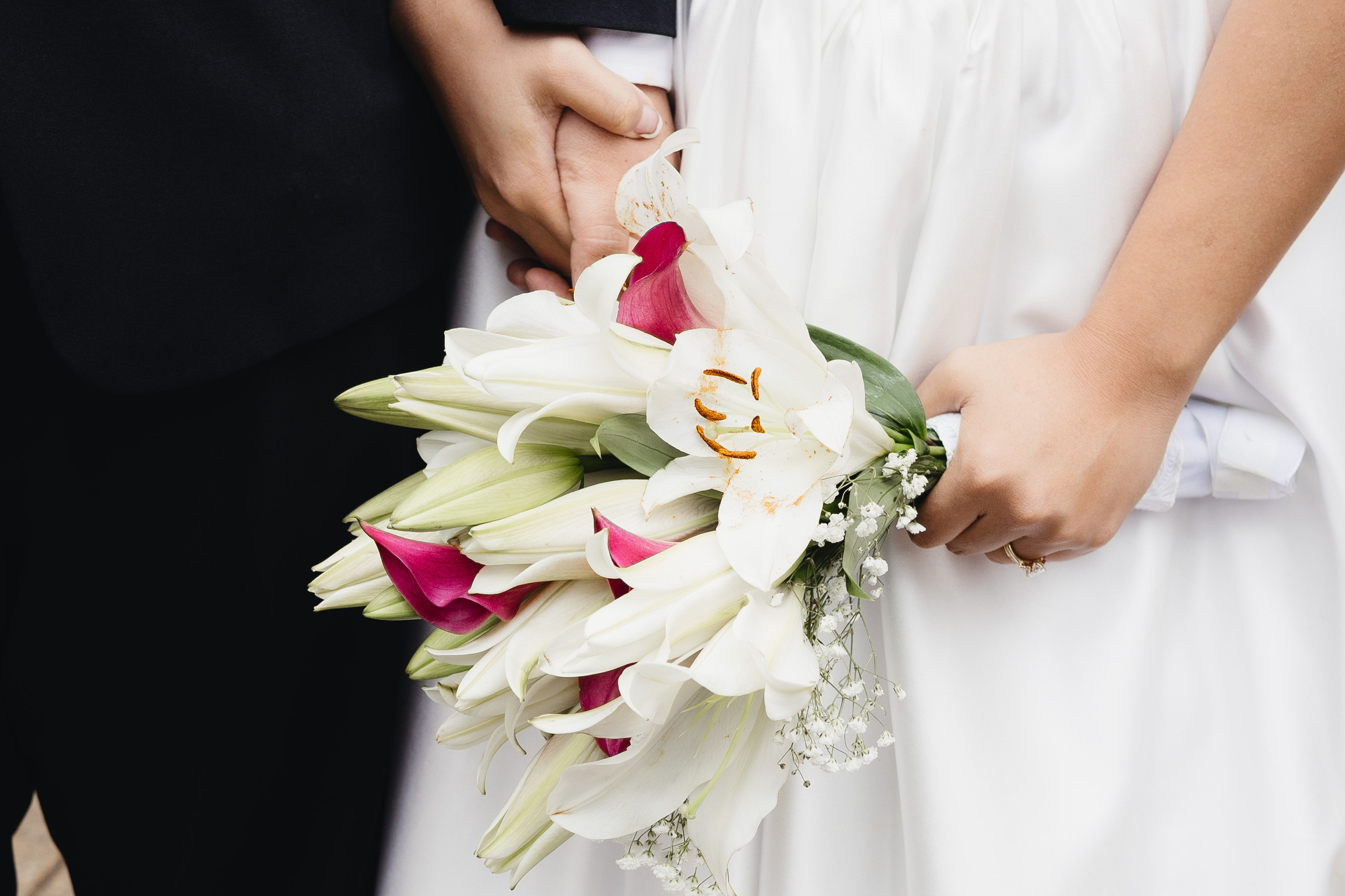 Close-up of bride holding her bouquet