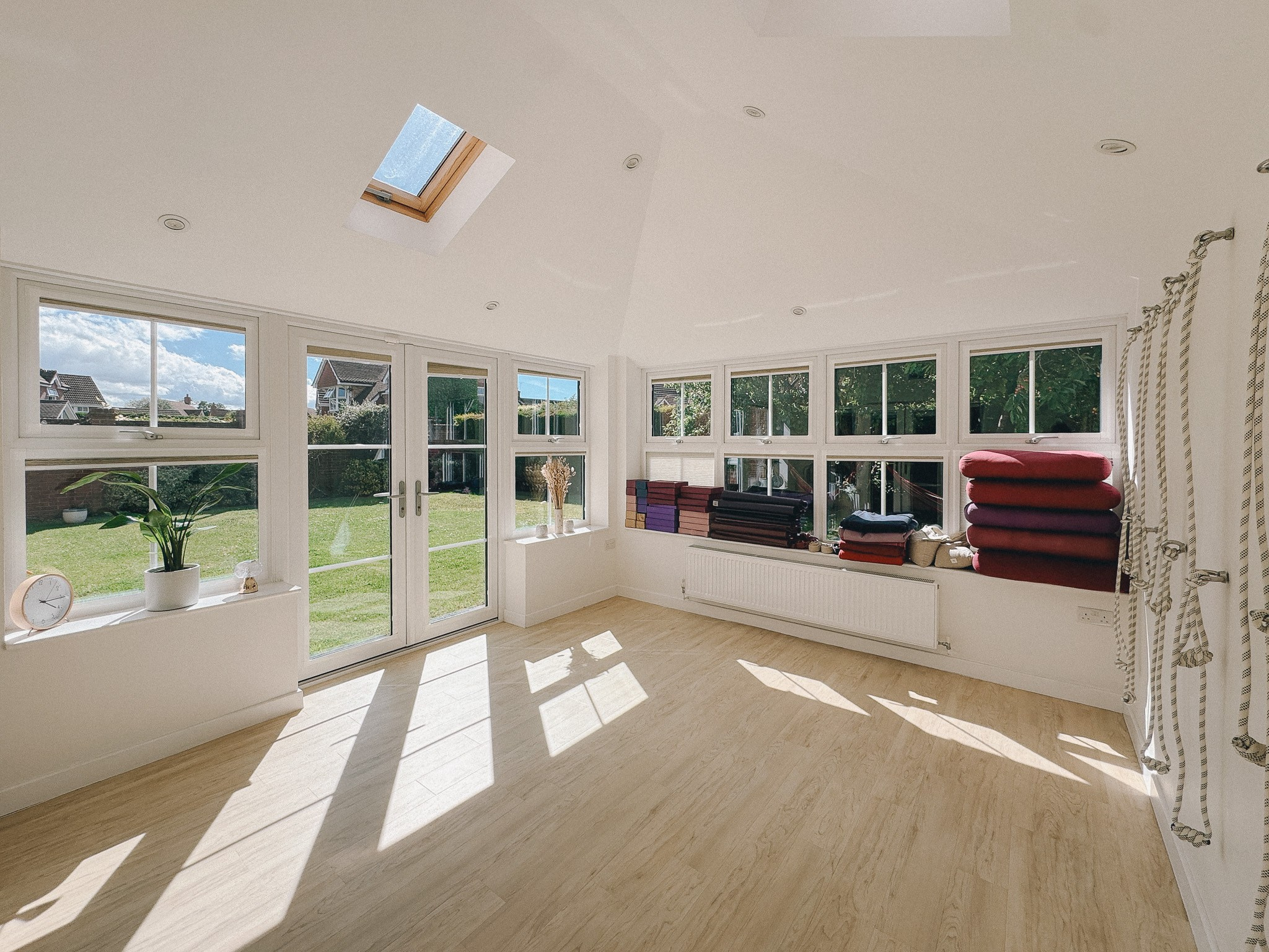 Iyengar yoga home studio in Solihull with natural light, garden view, mats and props prepared for private and small group classes