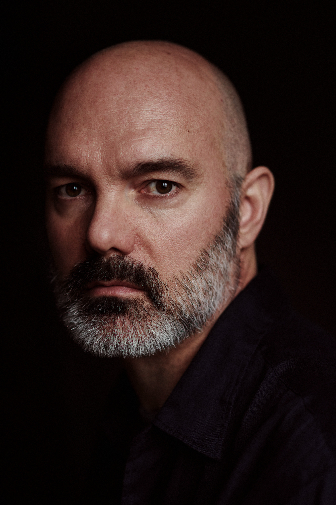 artist Ruan in his dark studio in Amsterdam.