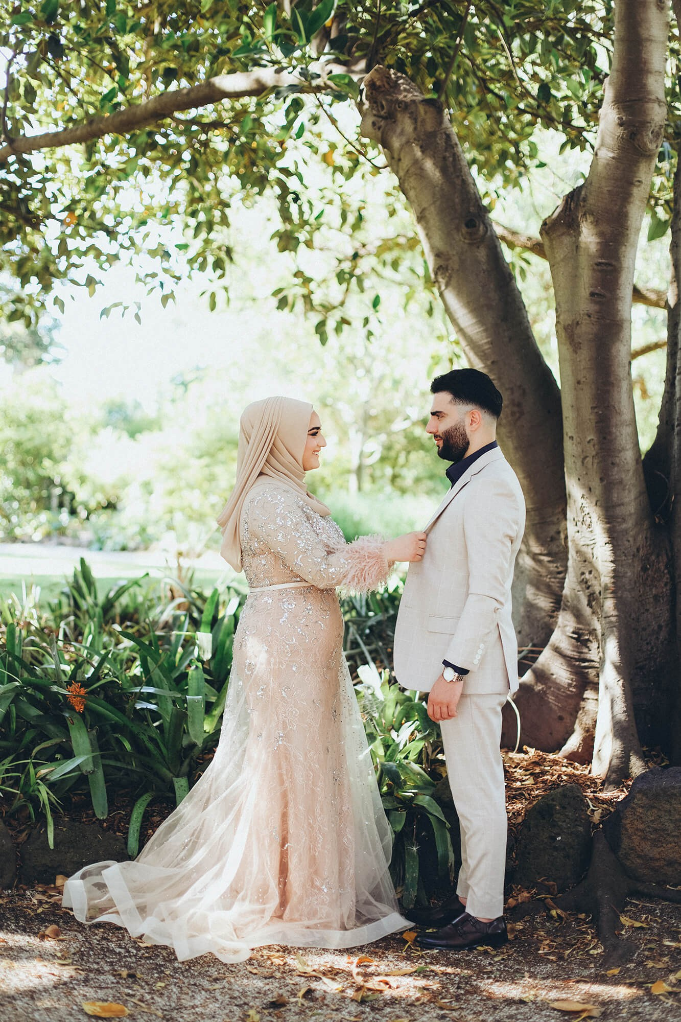 Romantic wedding photography in Melbourne, capturing a newlywed couple sharing an intimate moment at sunset with Lifetime Chapters Photography.