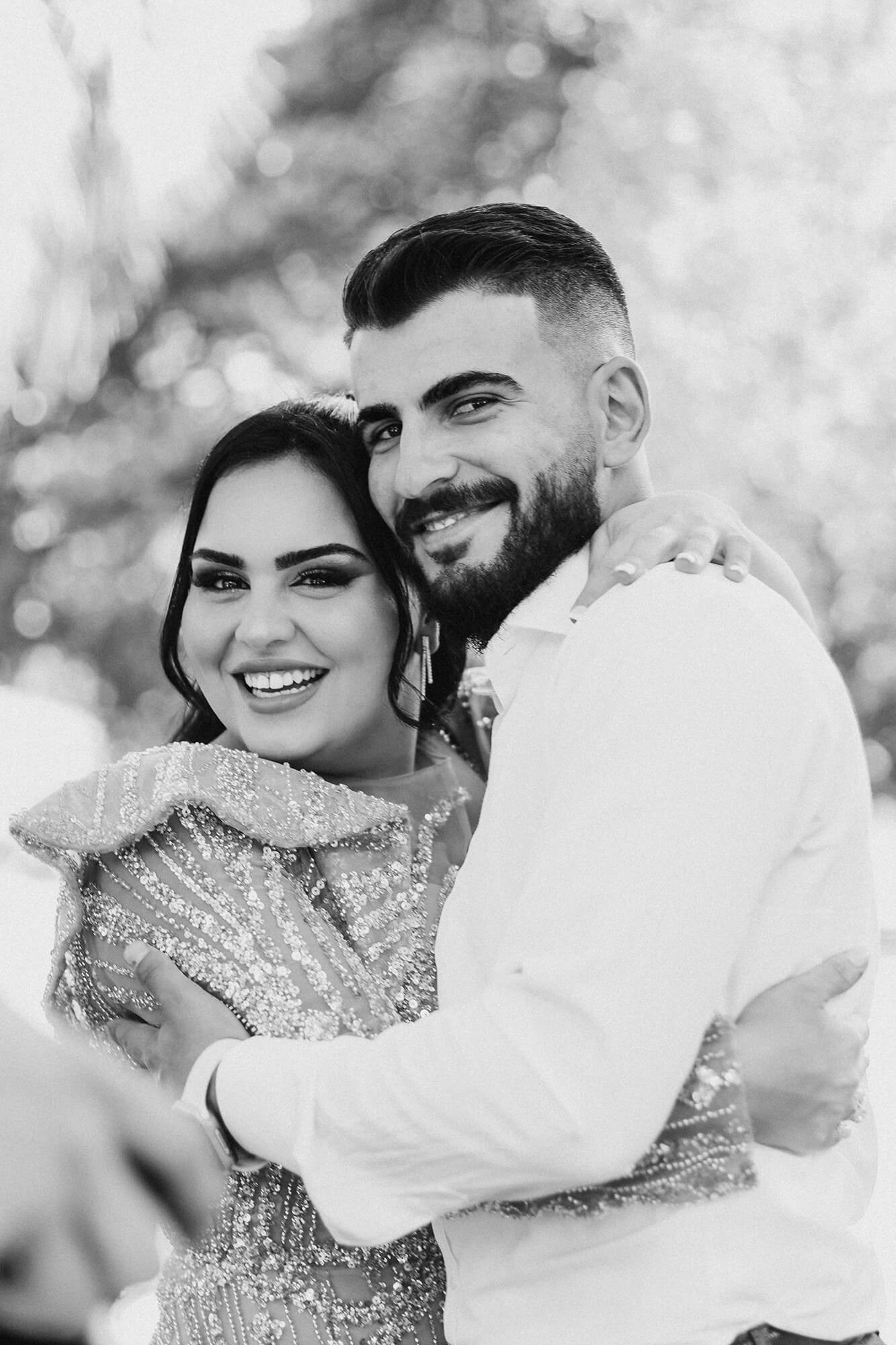 A groom adjusting his suit jacket before the ceremony, capturing the anticipation and preparation of a Melbourne wedding day.