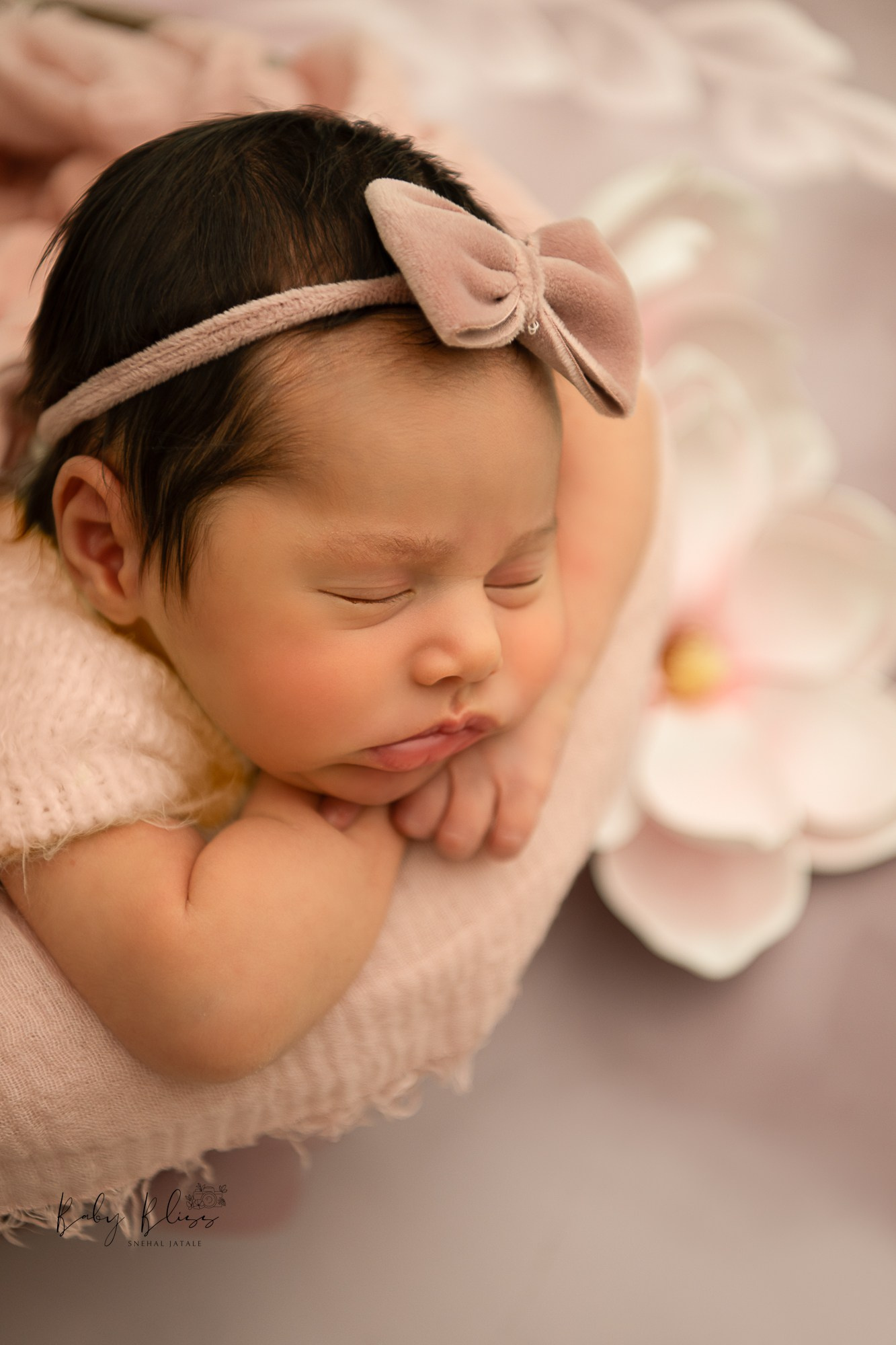newborn baby girl photo shoot in lavender colour in Doha, Qatar