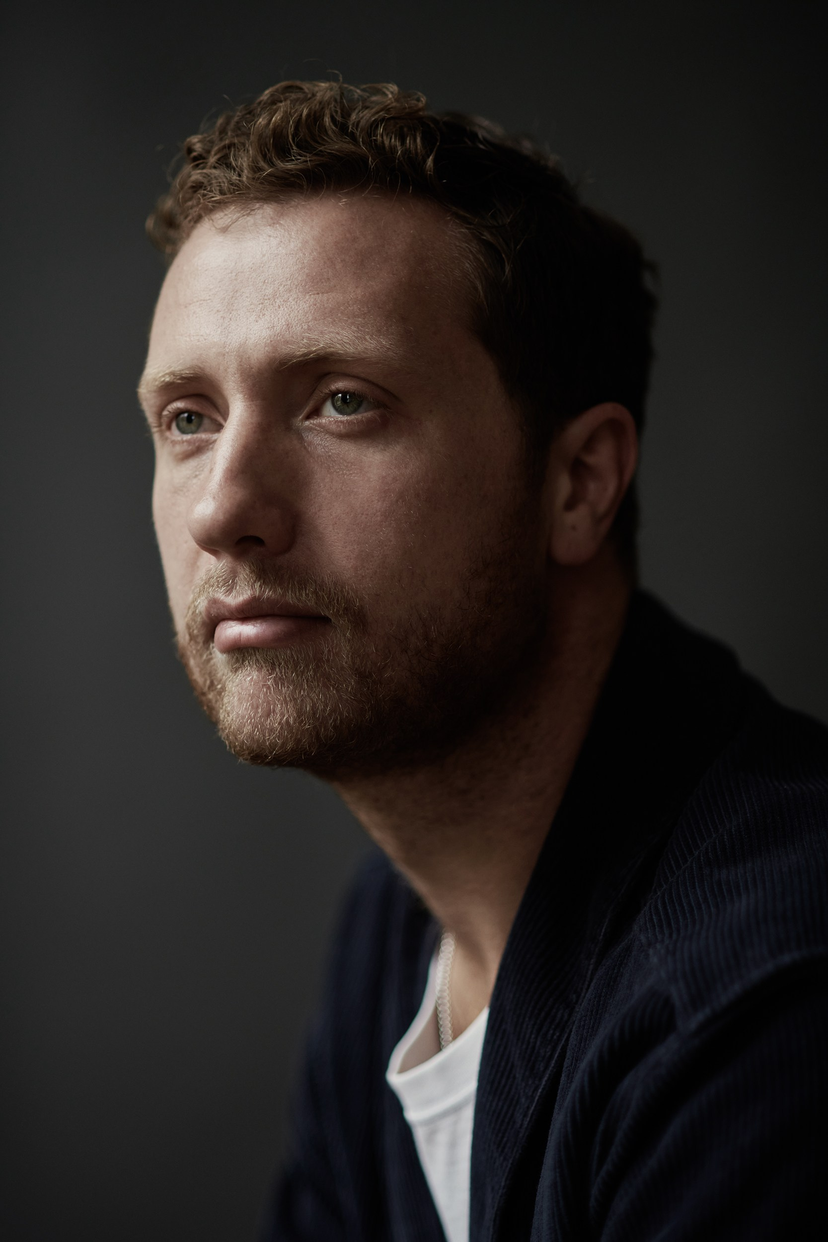 Headshot photographer, portrait of a young Actor from London, session made in Amsterdam photo studio