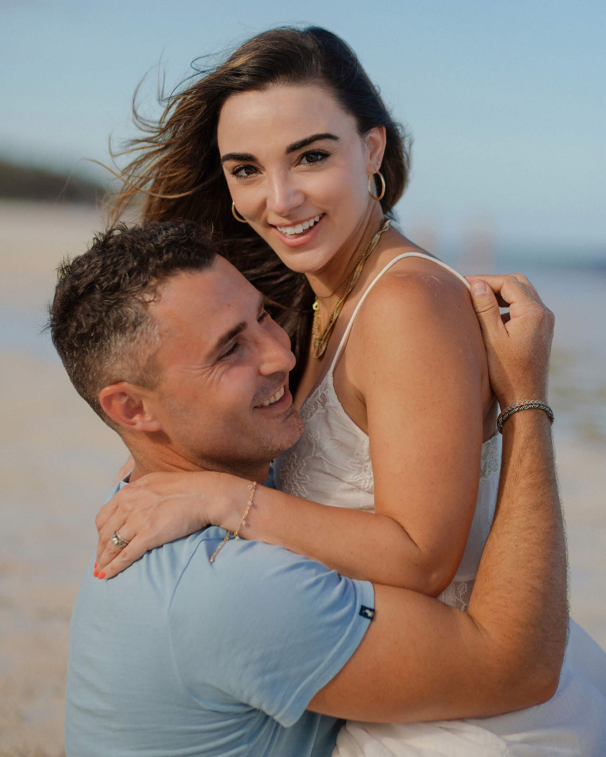 Diani Beach close-up love portrait, laughing couple anniversary.