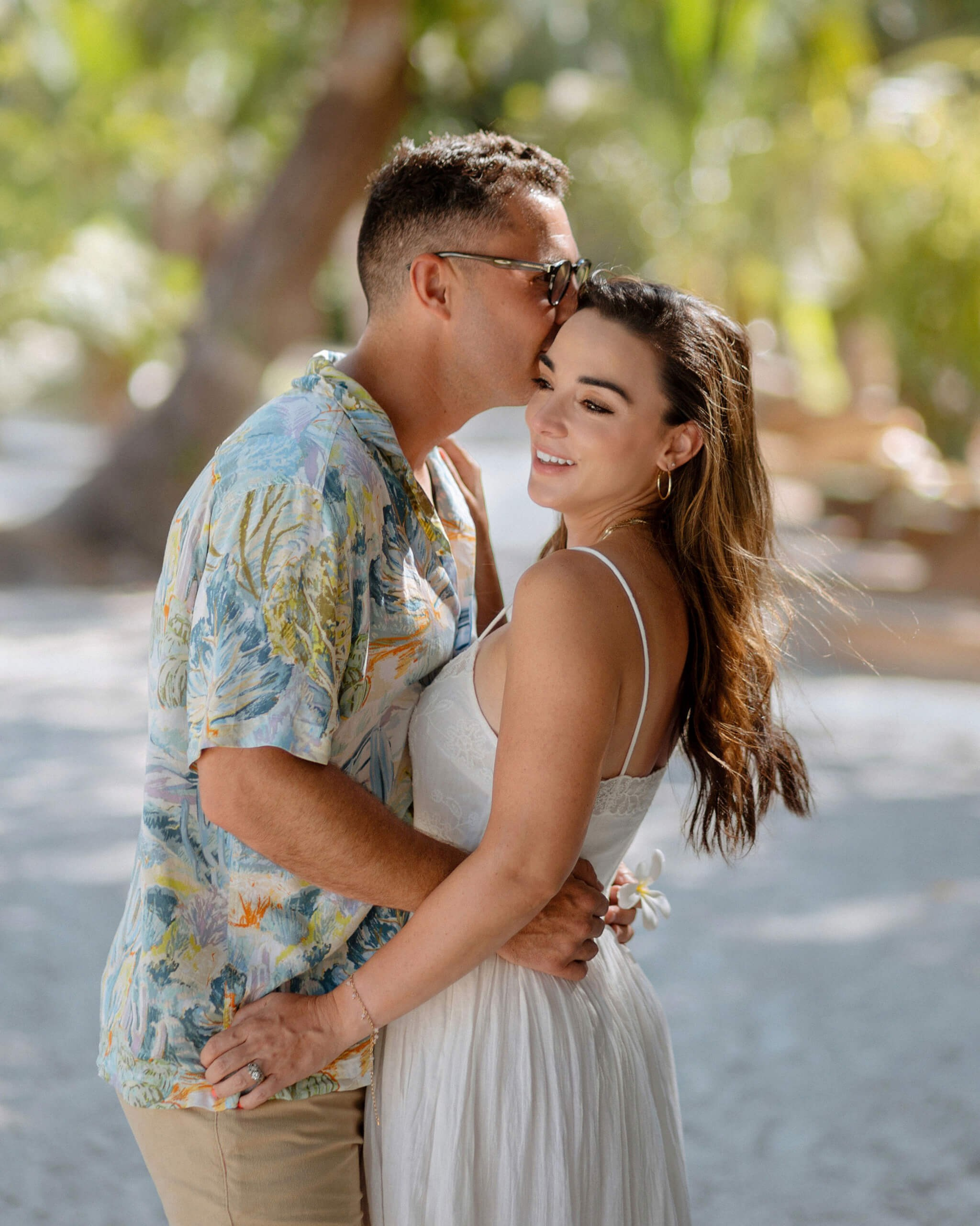 Kenya engagement shoot on Diani Beach with affectionate couple.