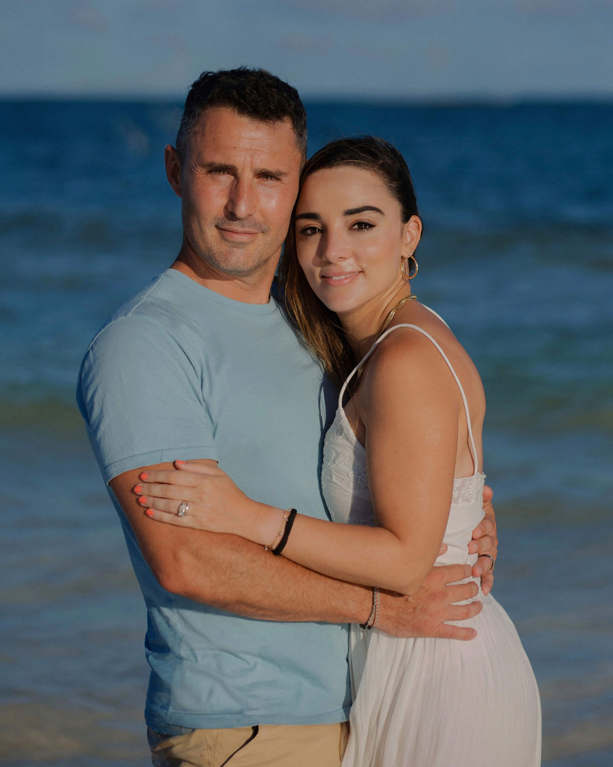 Diani Beach Kenya engagement photo session, romantic couple at shoreline.