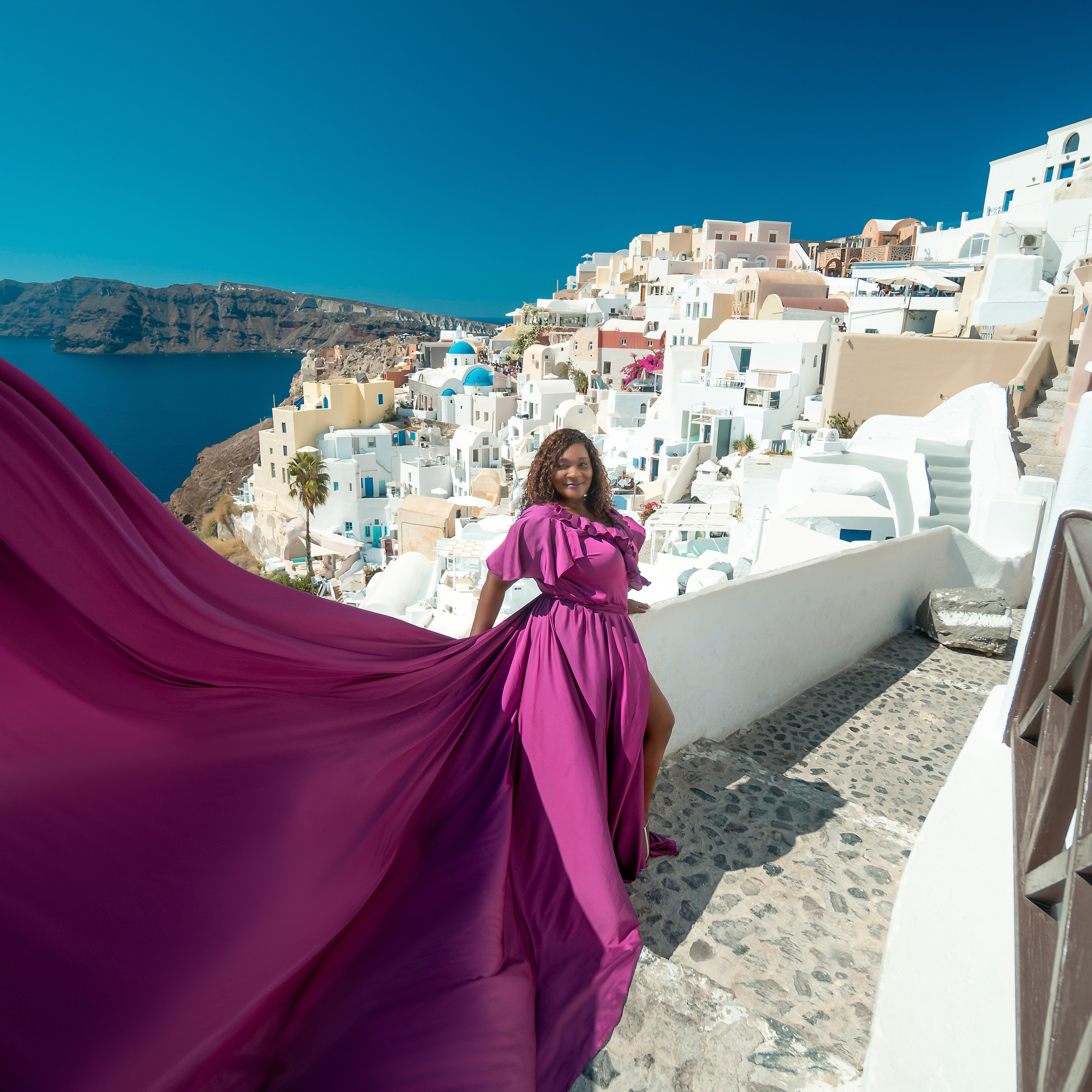 Red Long Sleeve Flying Dress Rent in Santorini. Photographer in Santorini SokoLOVE Alex| Flying Dress Santorini