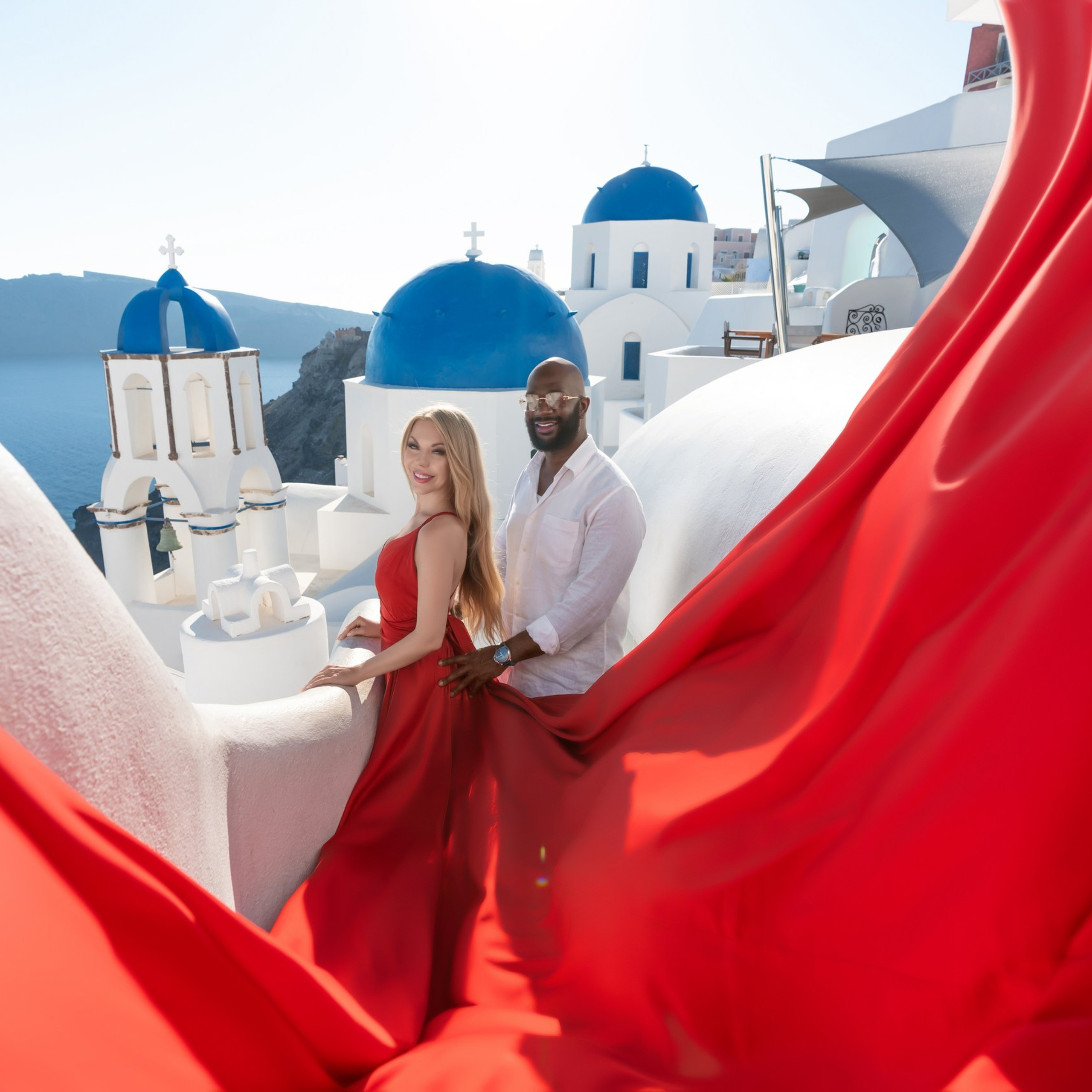 Ethereal Romance: A&nbsp;Breathtaking Flying Dress Photoshoot in&nbsp;Santorini