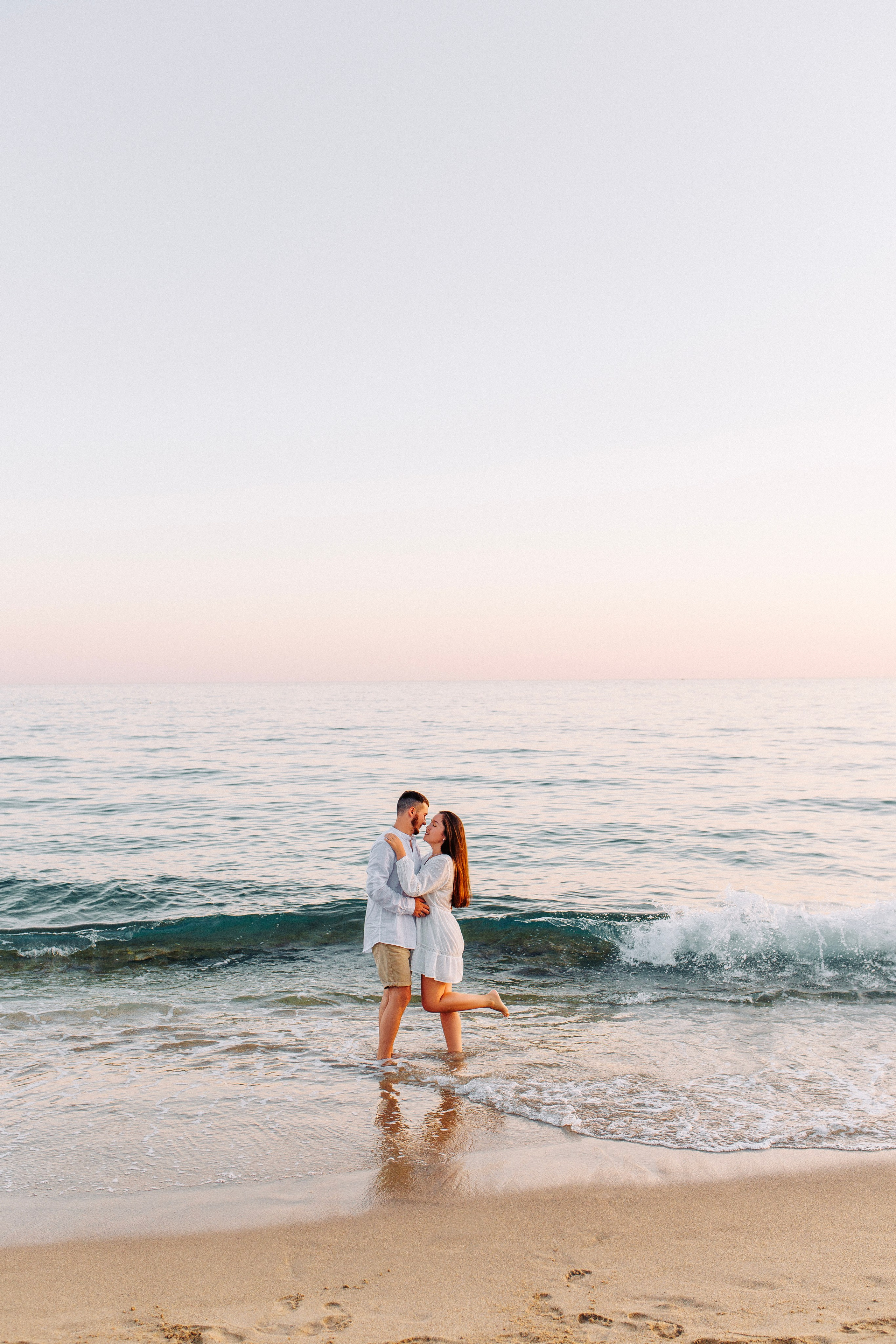Sunset. Photo session on the beach for couples