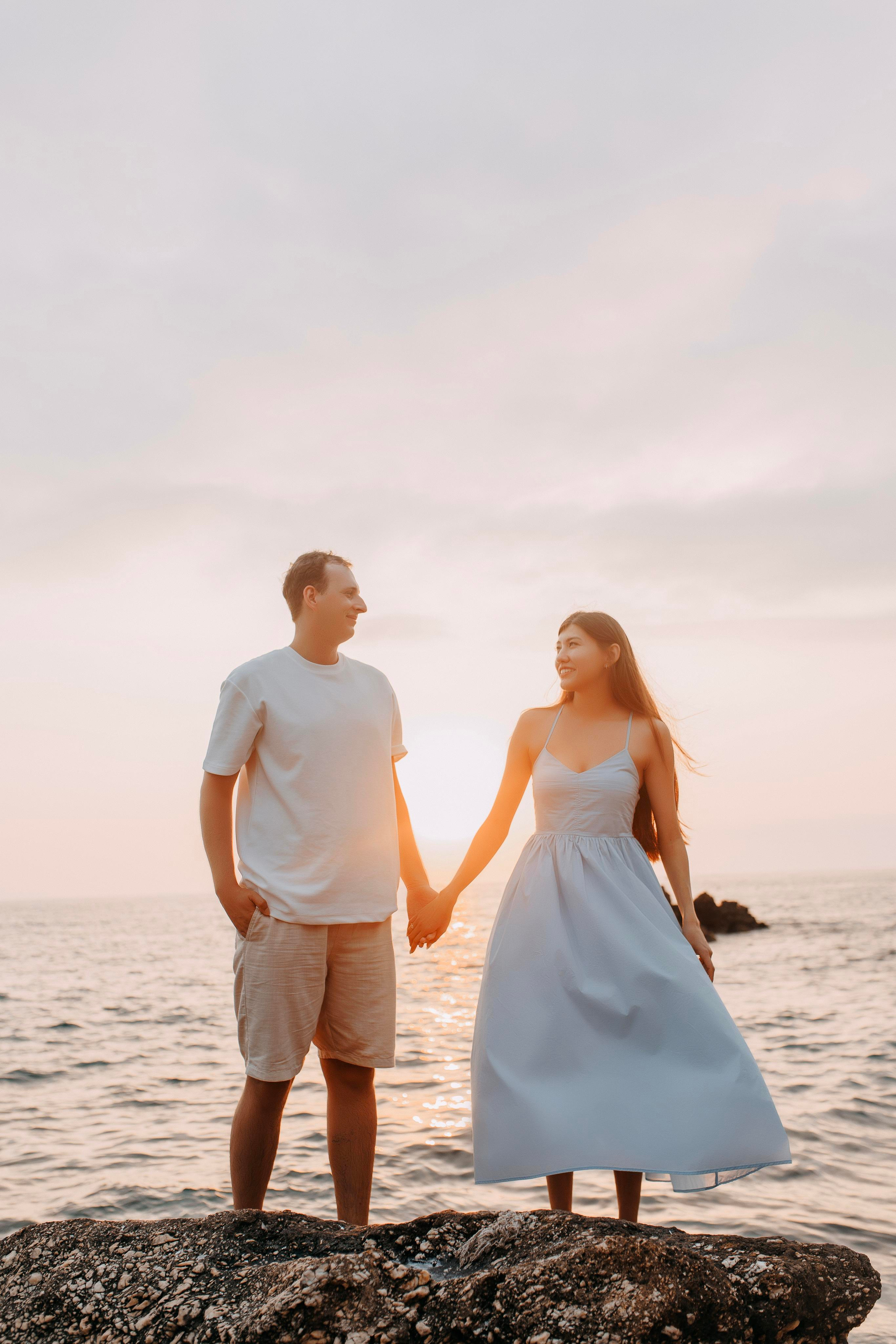 Sunset. Photo session of a love story on the beach at sunset