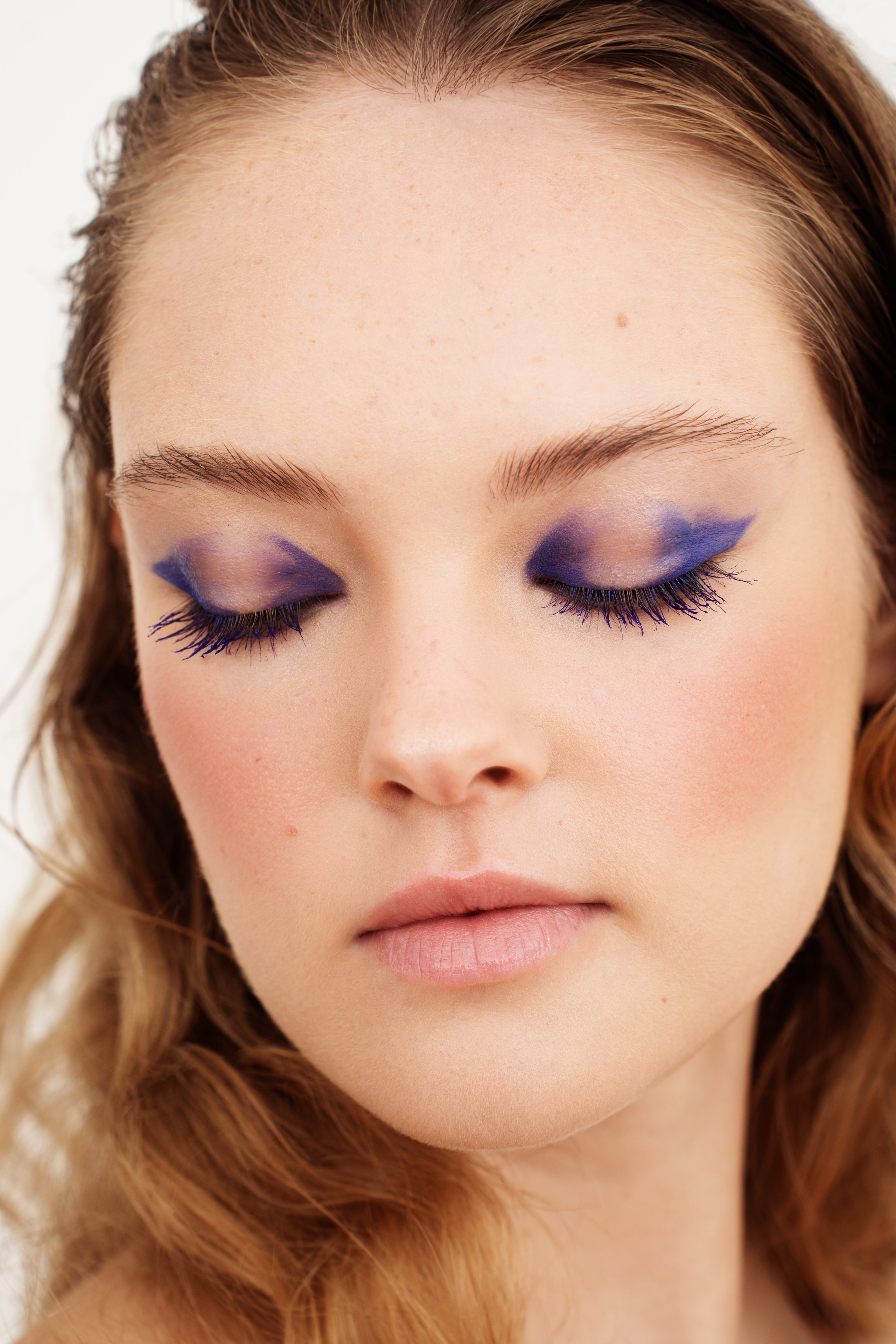 Detailed face retouching with natural skin texture preserved