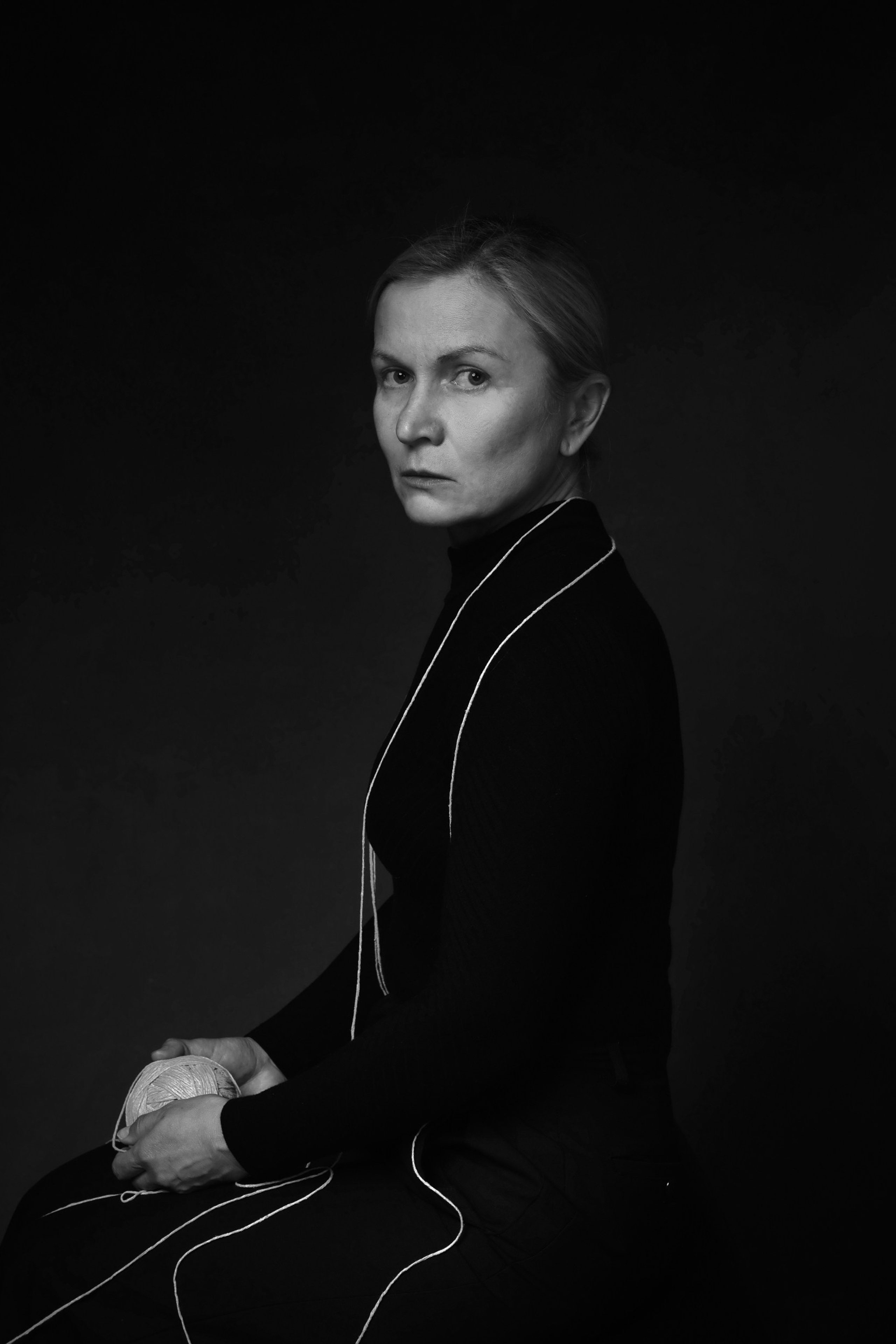 Unraveling the tangle of complex emotions, I find my face.