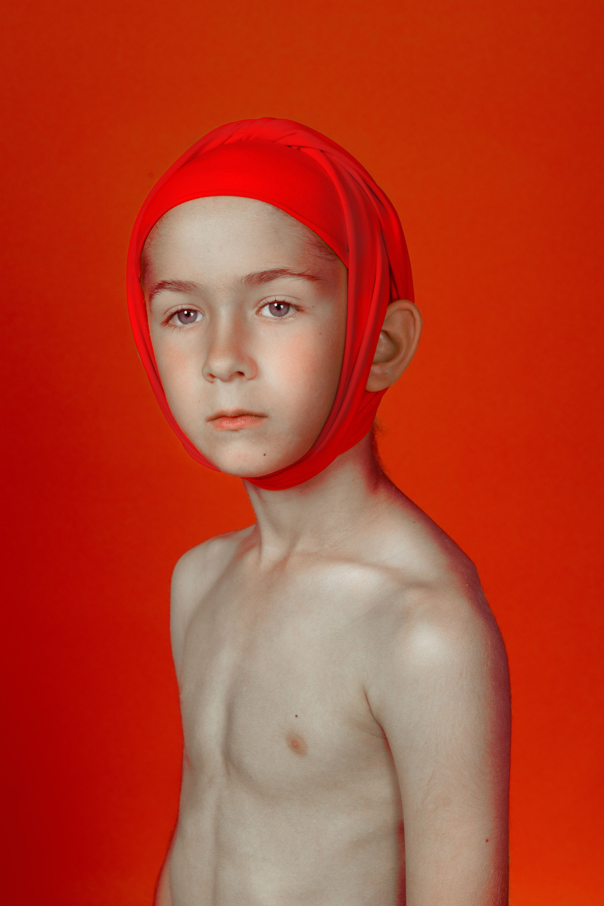portrait photography child minimalism bold red artistic conceptual vibrant