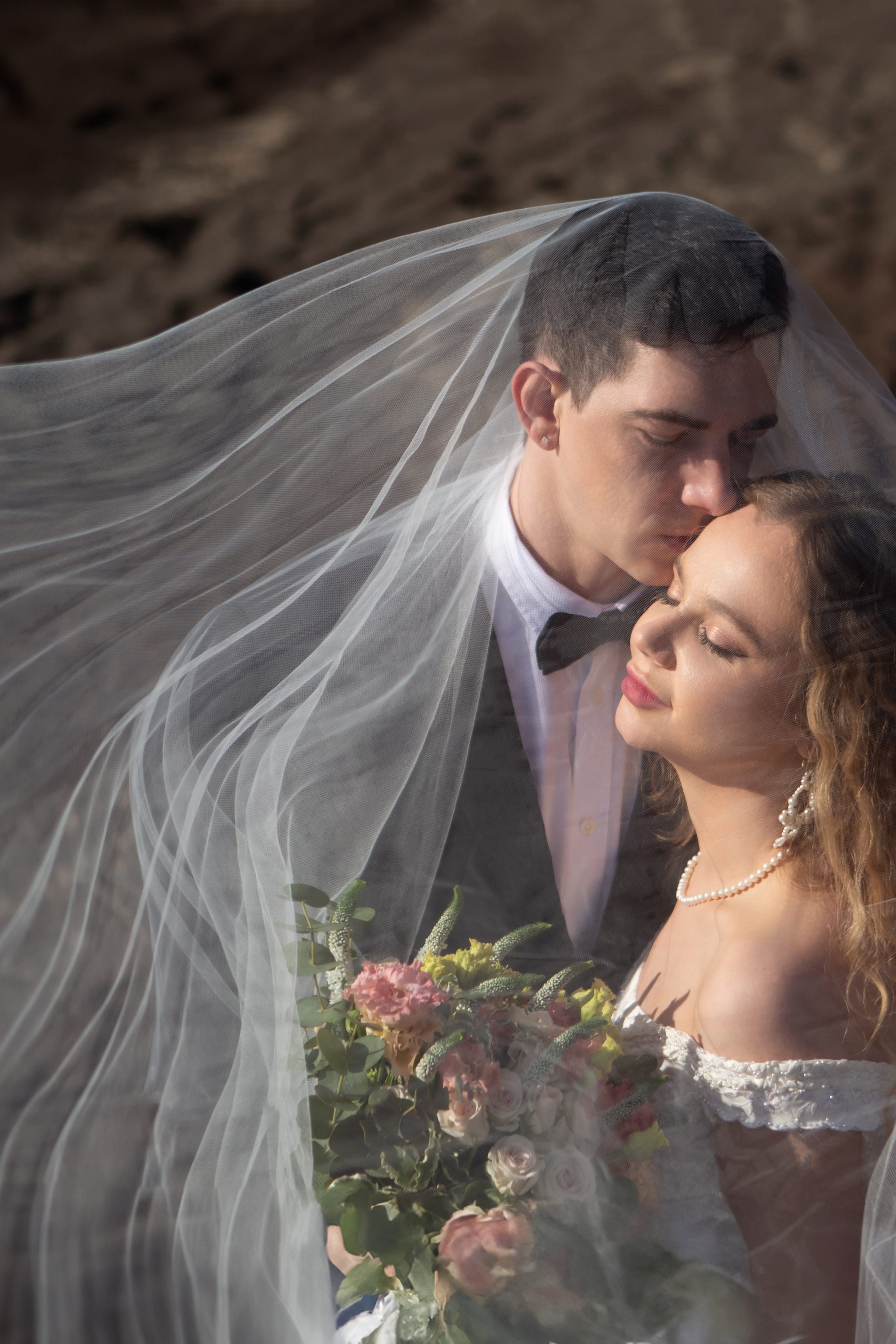 Wedding couple photographed in a Mediterranean landscape