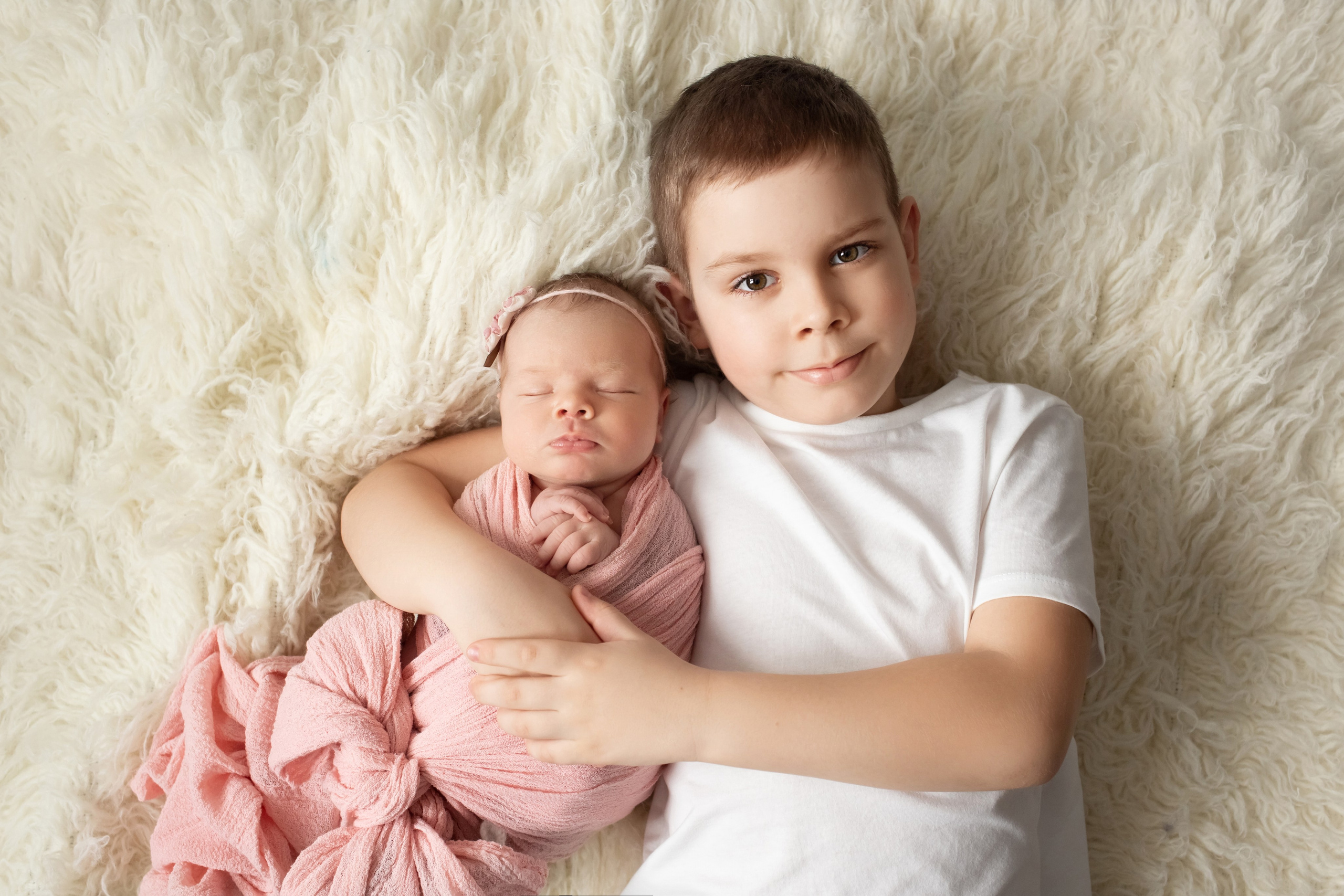 Newborn baby sleeping peacefully in natural light