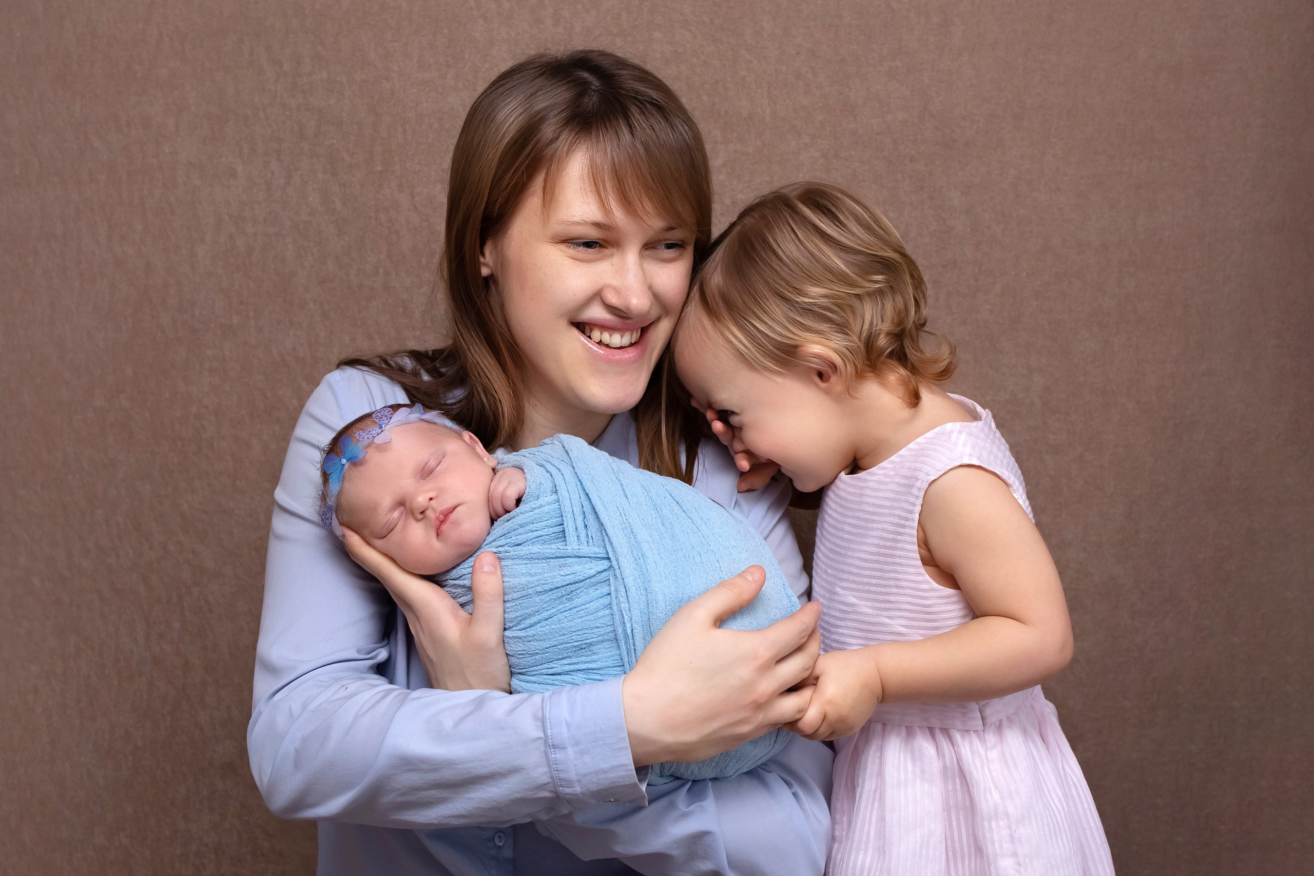 Mother holding her newborn baby