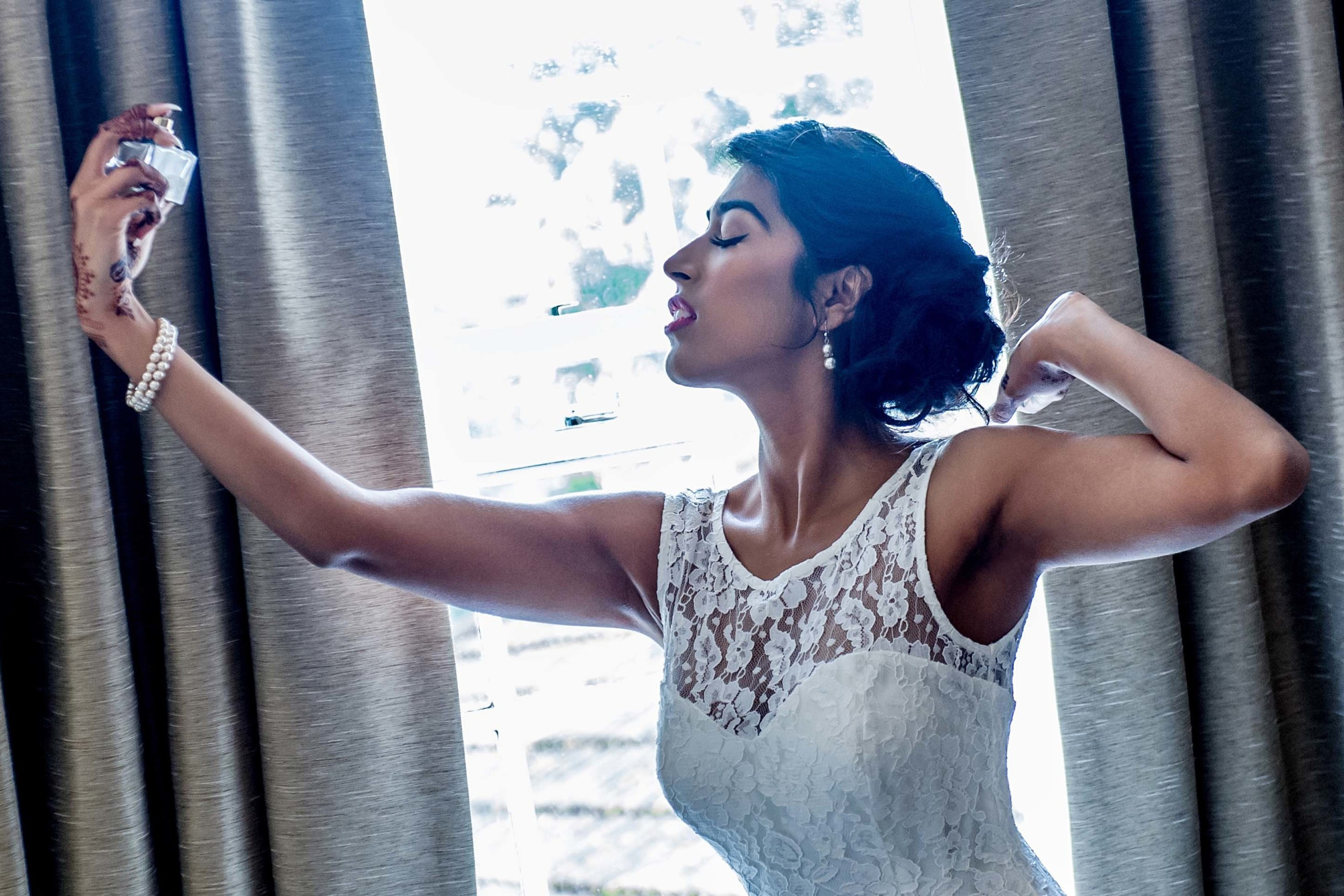 Wedding photographer Royal Berkshire, Ascot UK bride using perfume Nikon D850