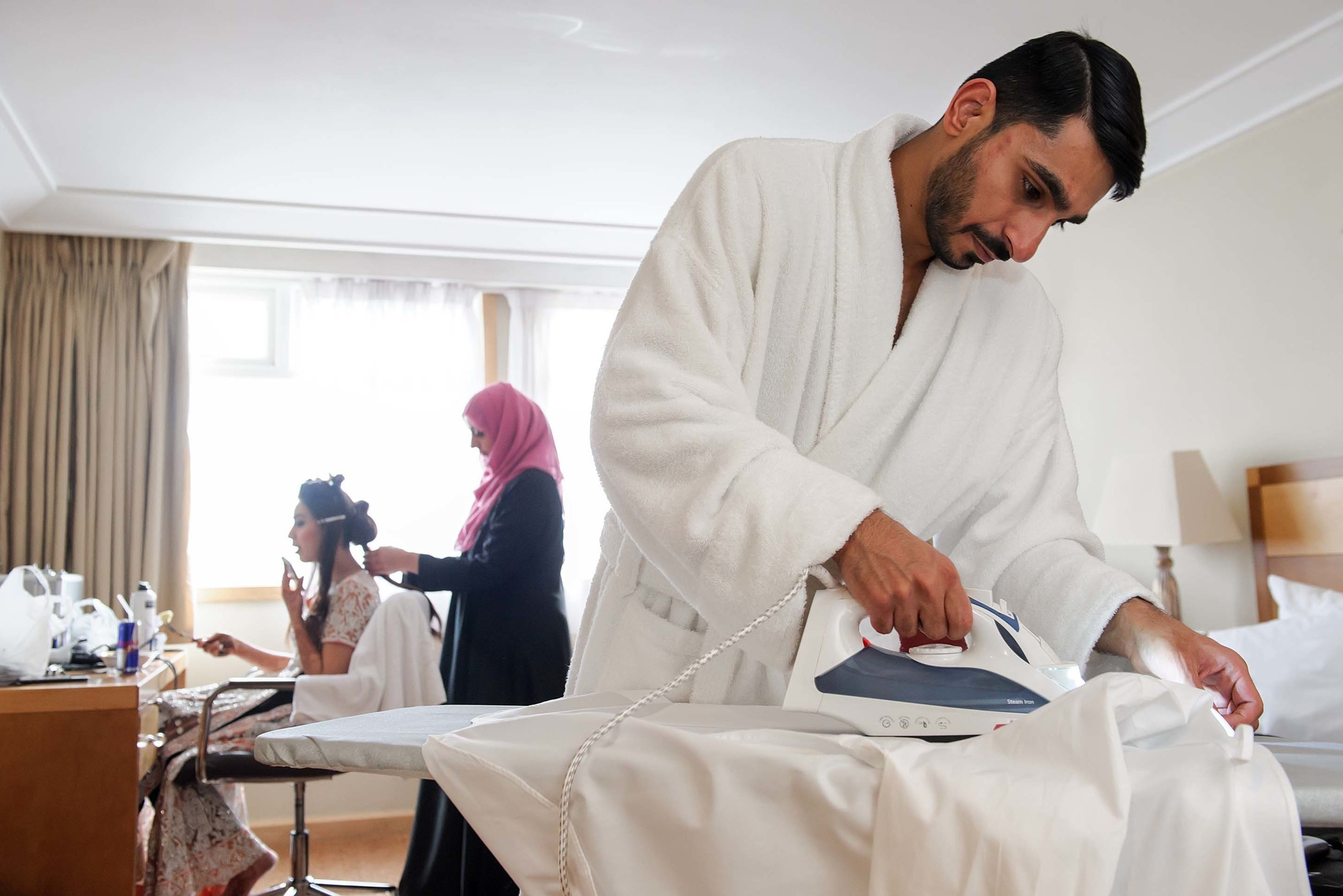 Wedding photographer Hilton Watford, London Uk Bride and groom getting ready Nikon D850