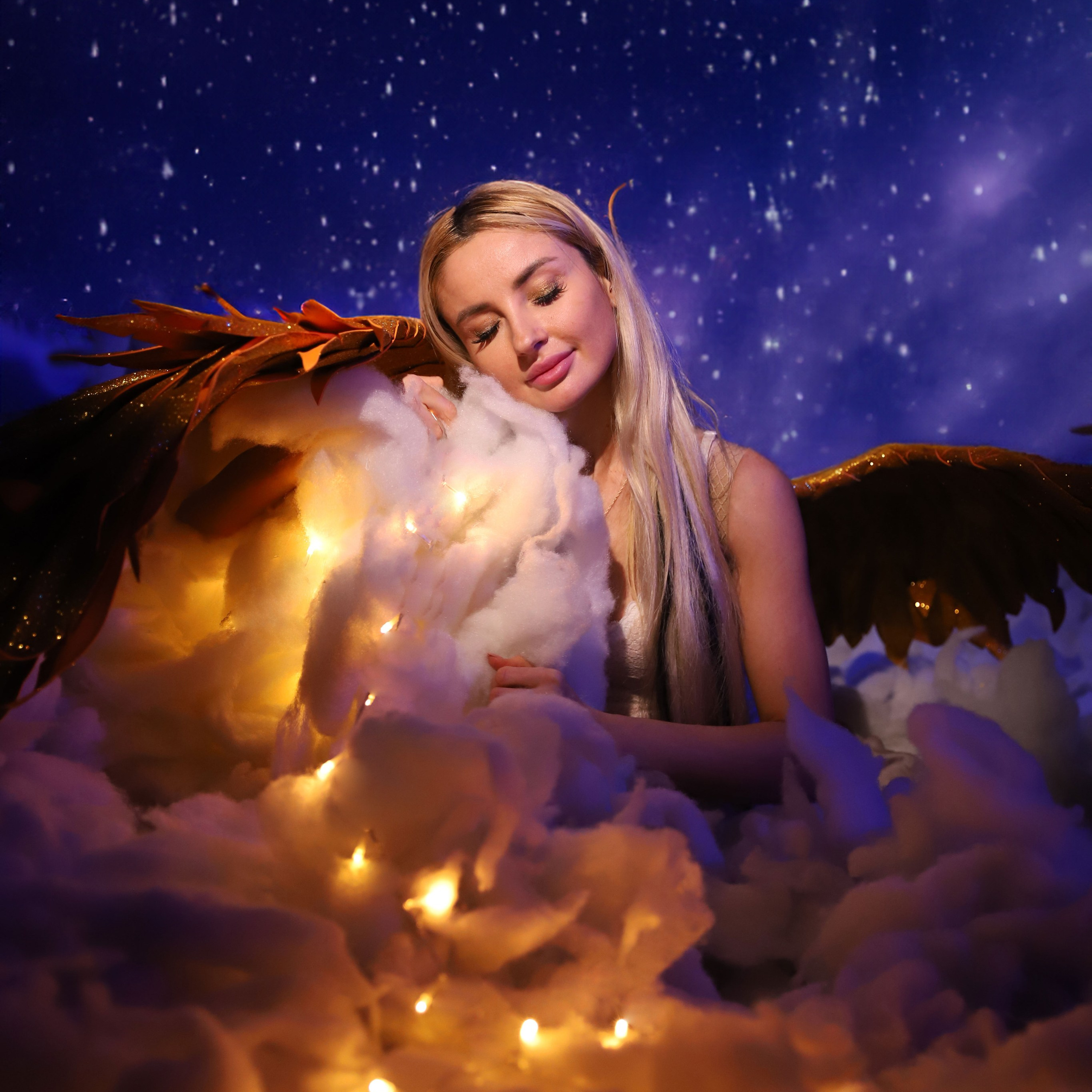 Купідони в хмаринках