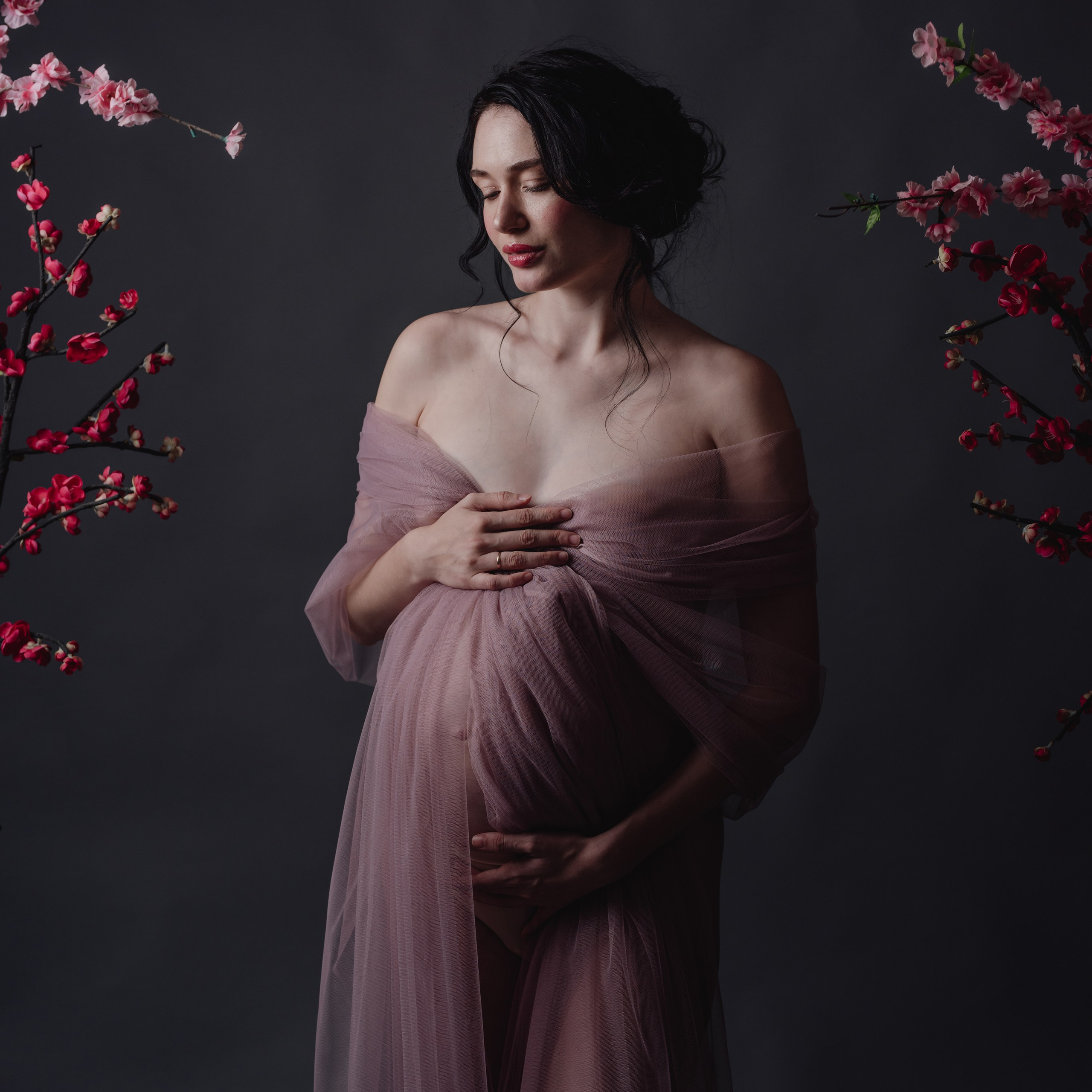 Maternity photoshoot in a studio