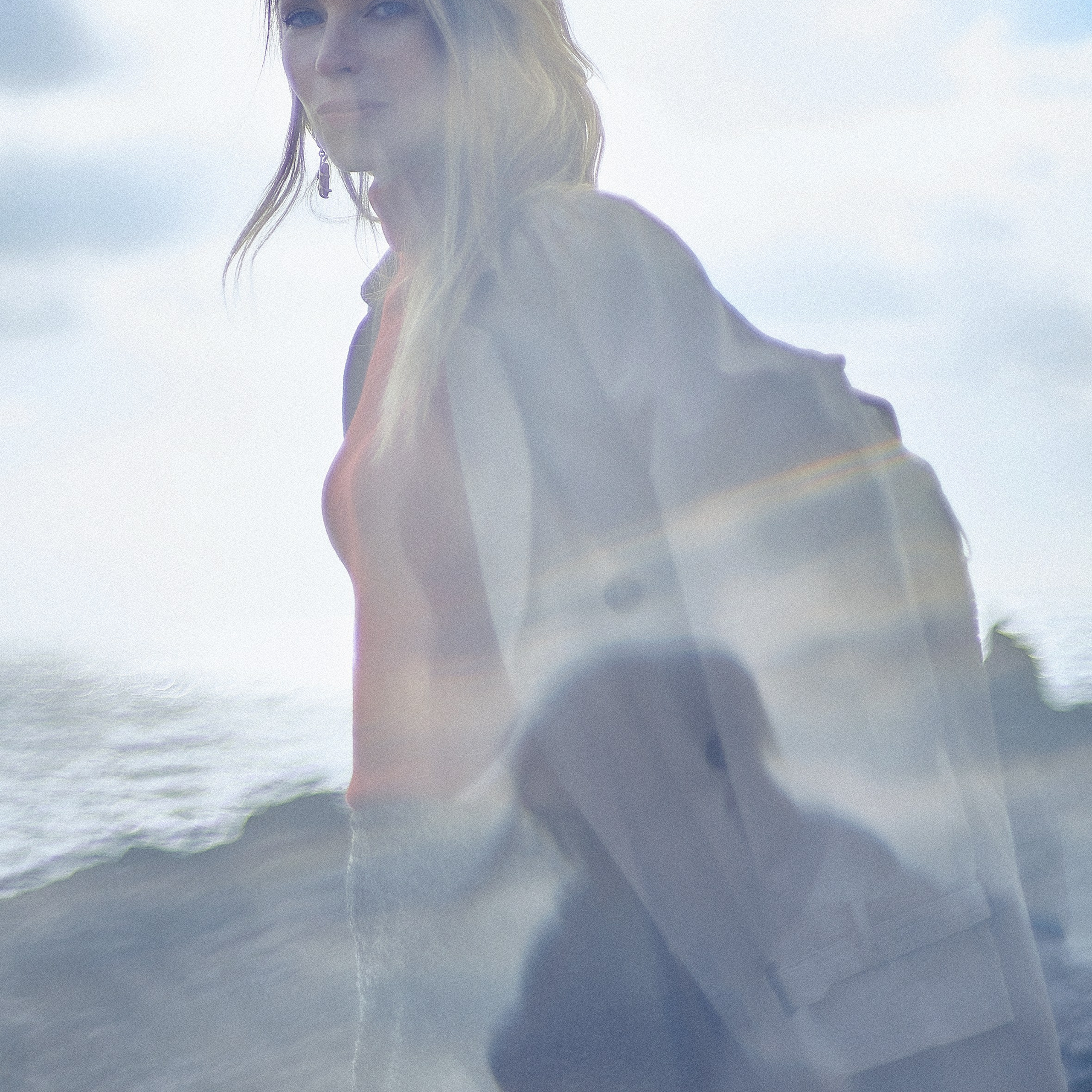 Artistic blurred and mysterious portrait of a woman, creative fashion photography
