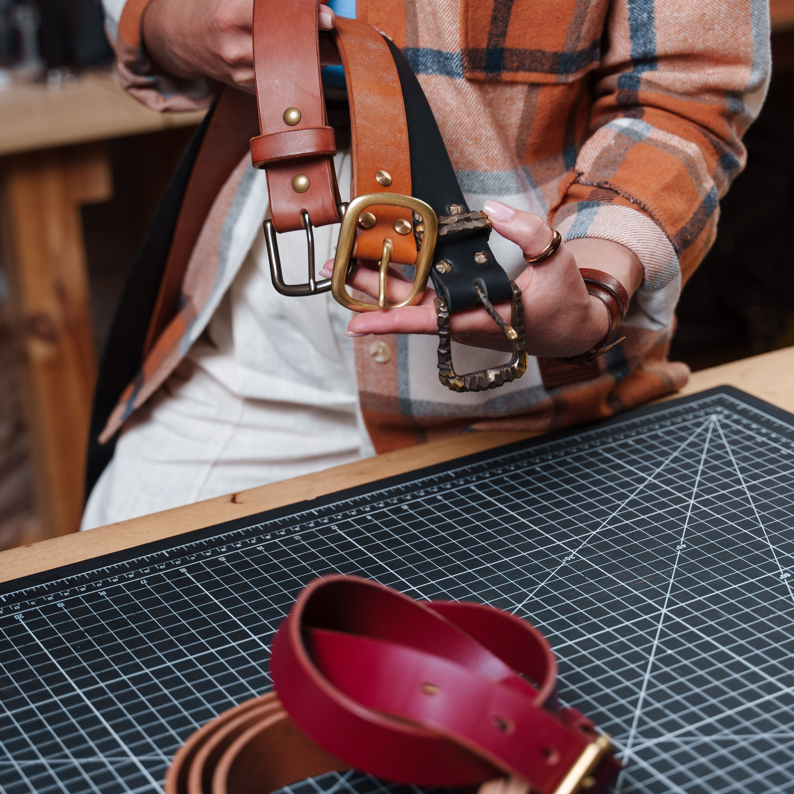 Photos of the craftsman in the leather workshop. Dmitrii Shmatov — High-End Portrait & Fashion Photographer in Milan