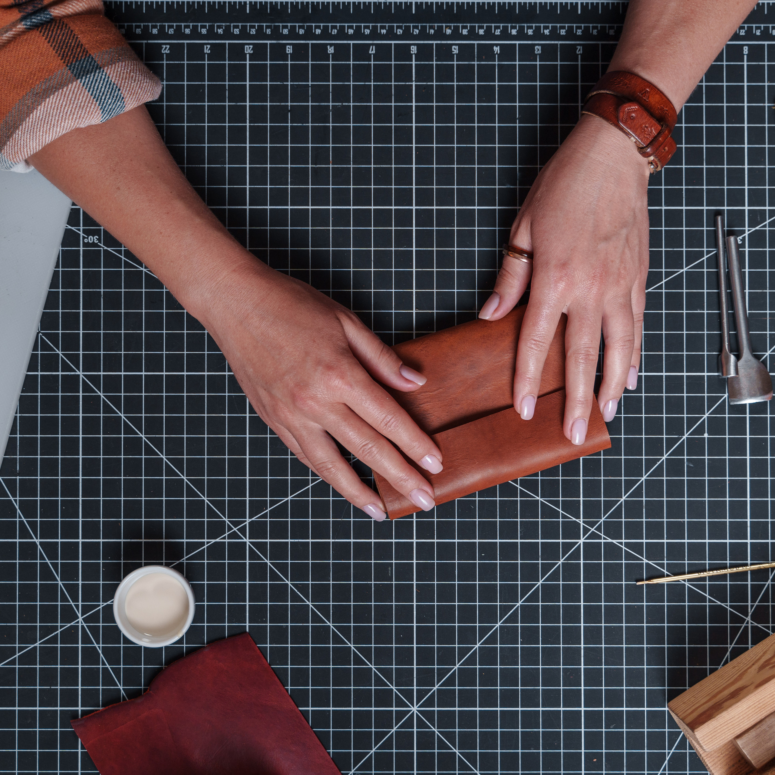 Photos of the craftsman in the leather workshop. Dmitrii Shmatov — High-End Portrait & Fashion Photographer in Milan