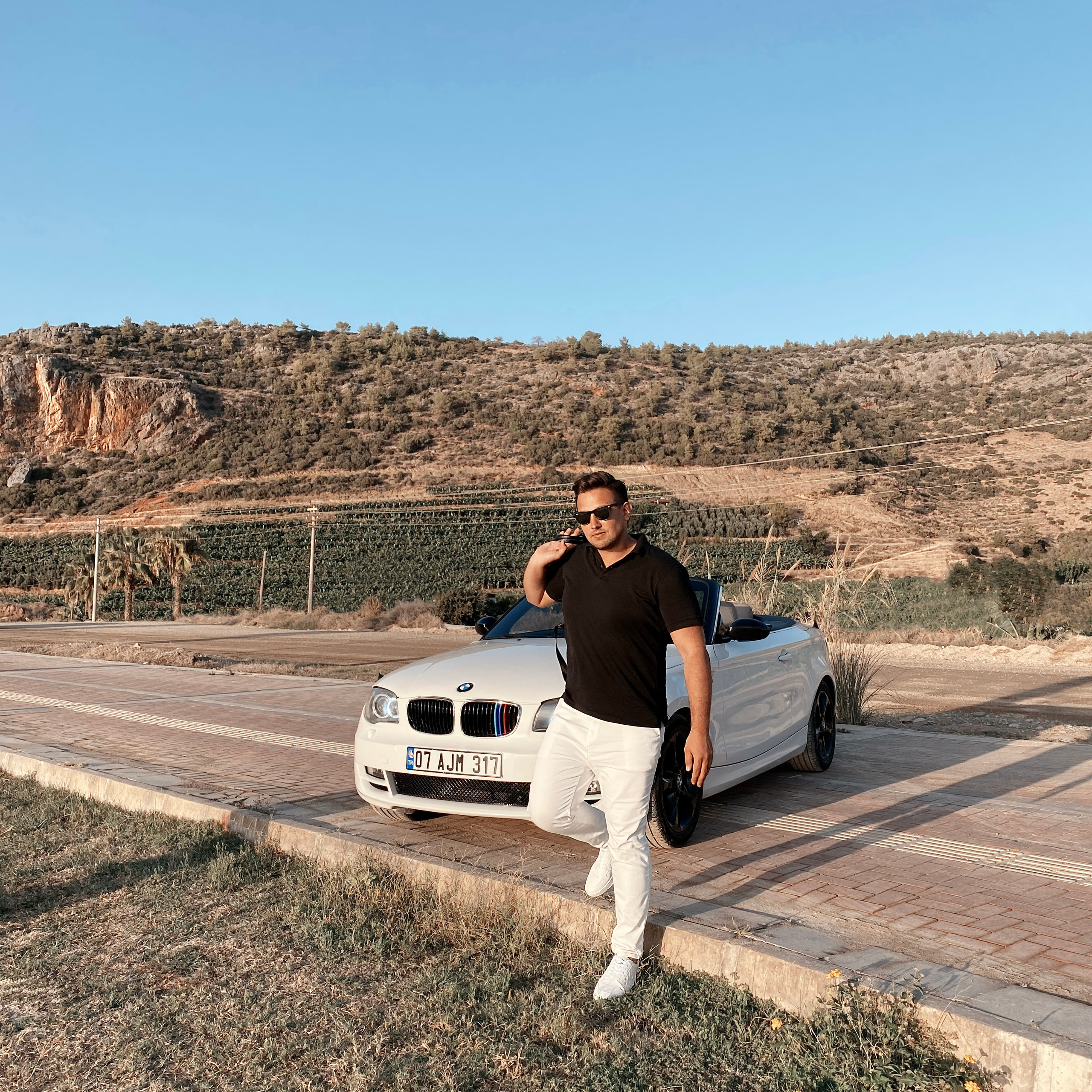 Filming for content with a cabriolet. Alsu Develi, Photographer in Turkey, Alanya, Side, Belek, Antalya, Kemer, Turkiye. Photoshooting in Alanya. Photosession in Belek, Side