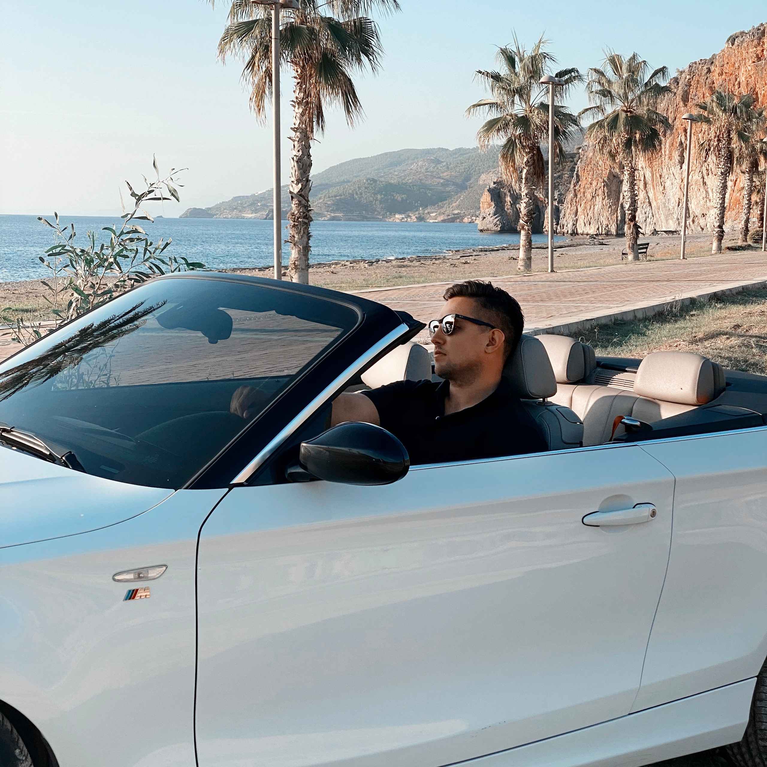 Filming for content with a cabriolet. Alsu Develi, Photographer in Turkey, Alanya, Side, Belek, Antalya, Kemer, Turkiye. Photoshooting in Alanya. Photosession in Belek, Side