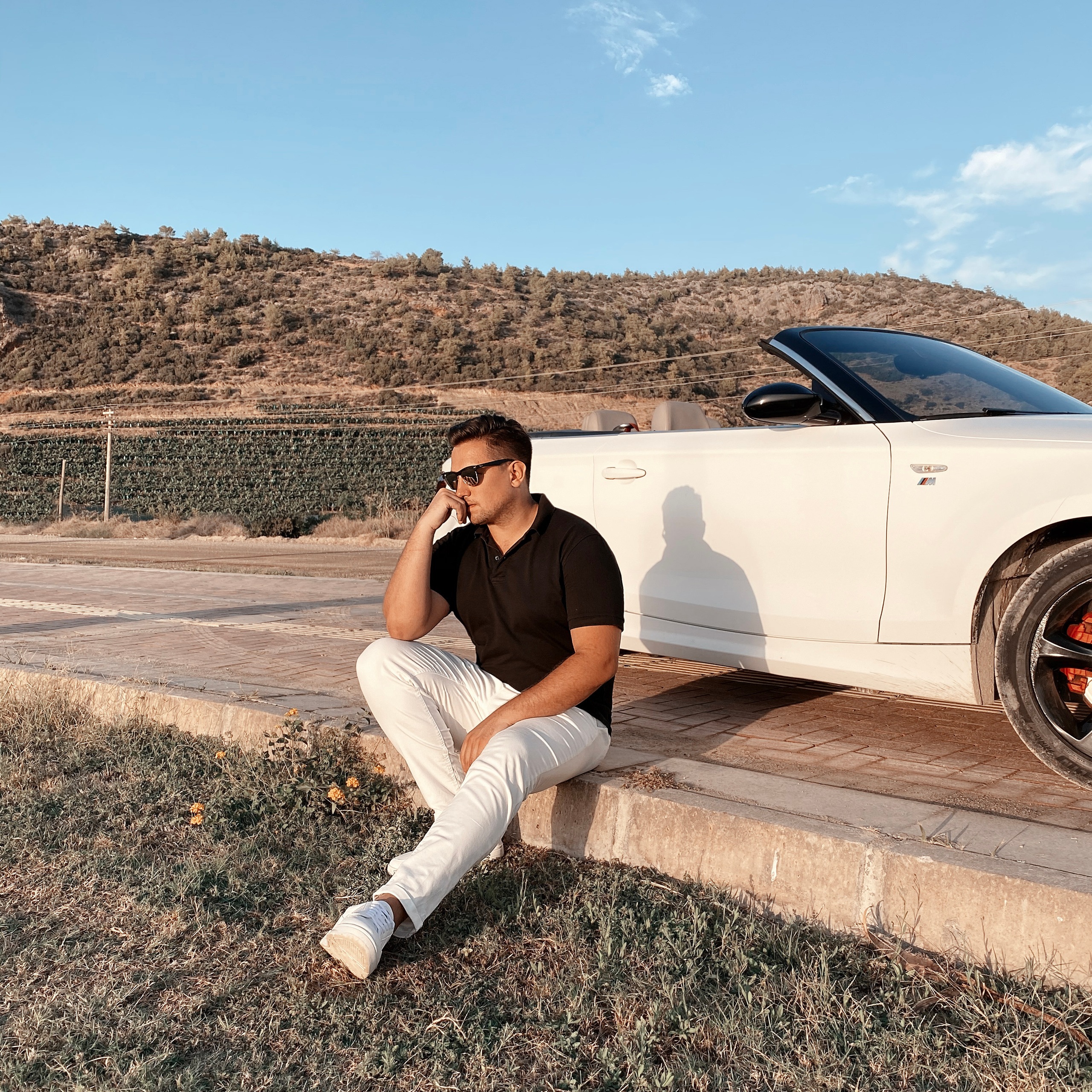 Filming for content with a cabriolet. Alsu Develi, Photographer in Turkey, Alanya, Side, Belek, Antalya, Kemer, Turkiye. Photoshooting in Alanya. Photosession in Belek, Side