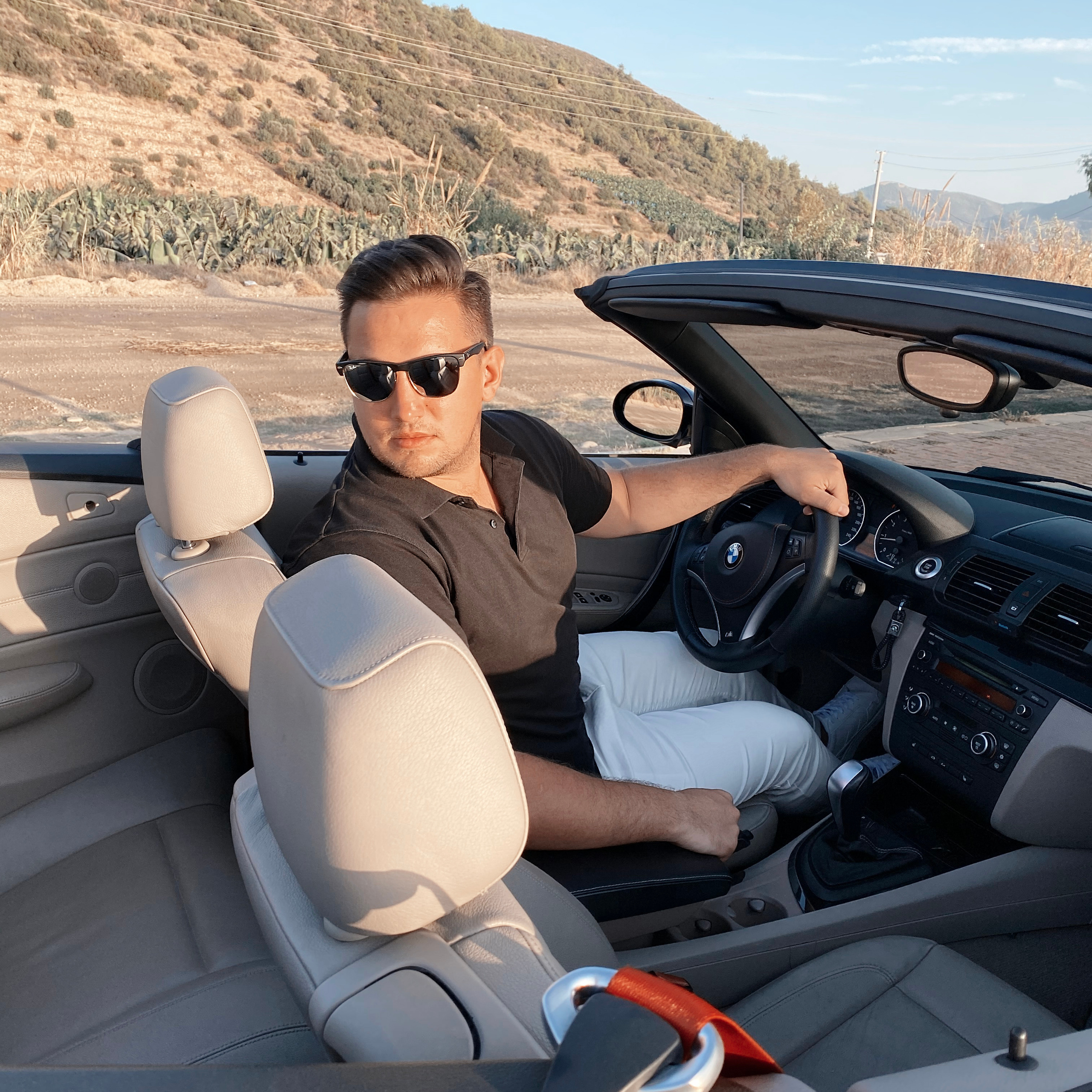 Filming for content with a cabriolet. Alsu Develi, Photographer in Turkey, Alanya, Side, Belek, Antalya, Kemer, Turkiye. Photoshooting in Alanya. Photosession in Belek, Side