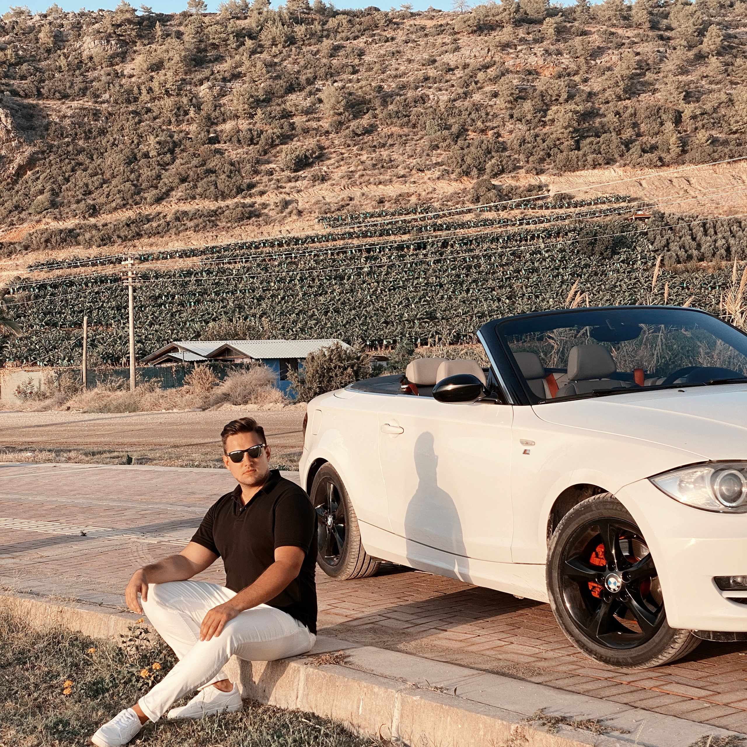 Filming for content with a cabriolet. Alsu Develi, Photographer in Turkey, Alanya, Side, Belek, Antalya, Kemer, Turkiye. Photoshooting in Alanya. Photosession in Belek, Side