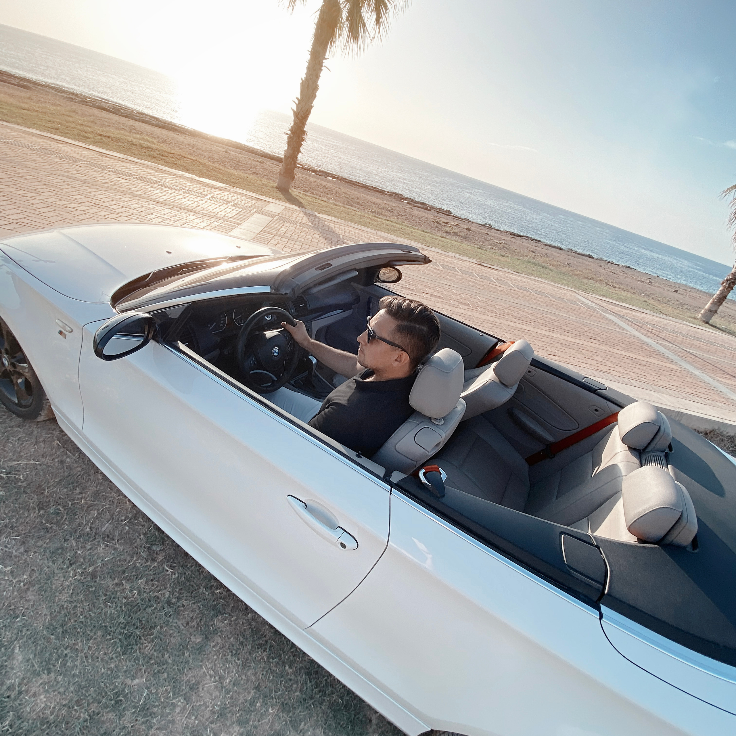 Filming for content with a cabriolet. Alsu Develi, Photographer in Turkey, Alanya, Side, Belek, Antalya, Kemer, Turkiye. Photoshooting in Alanya. Photosession in Belek, Side