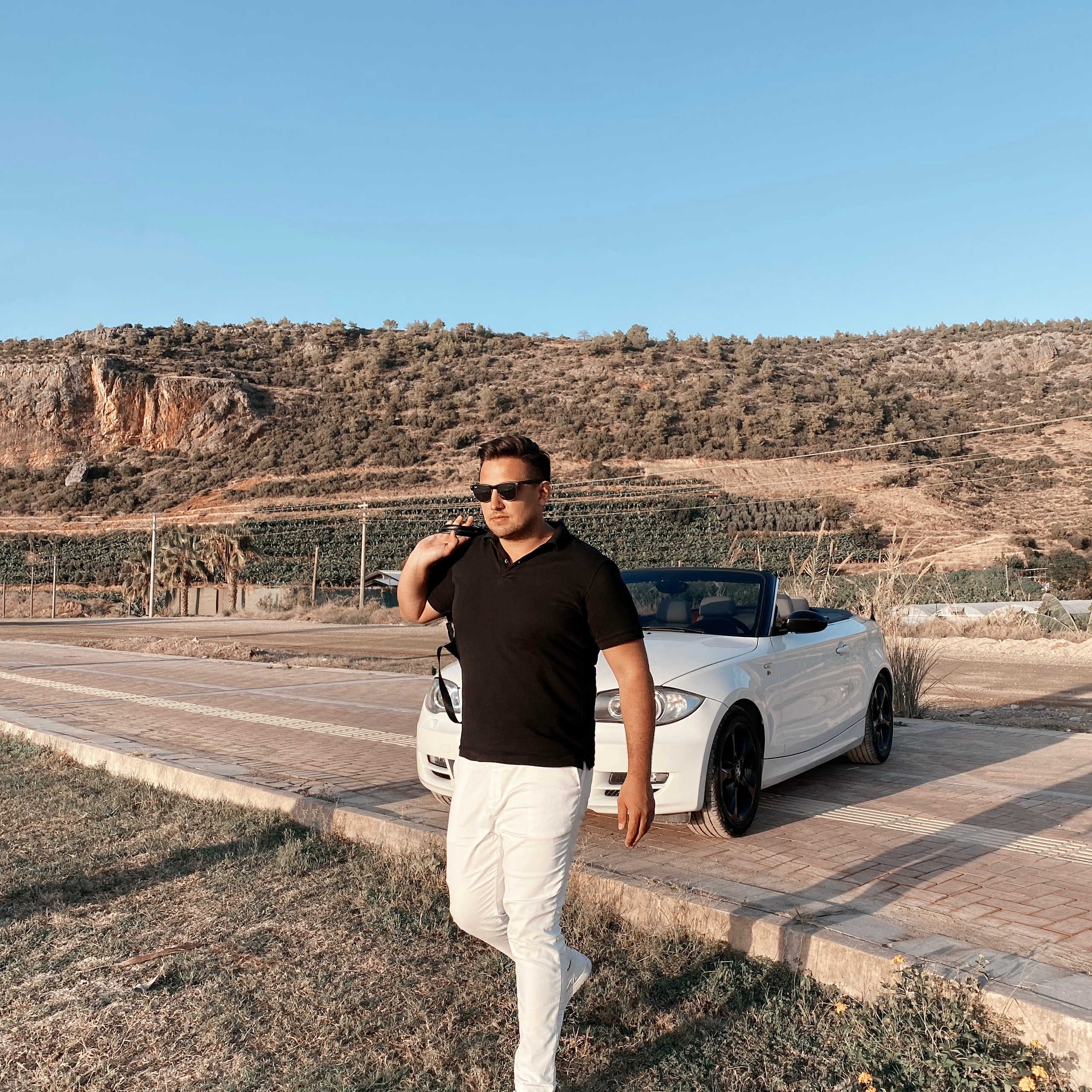 Filming for content with a cabriolet. Alsu Develi, Photographer in Turkey, Alanya, Side, Belek, Antalya, Kemer, Turkiye. Photoshooting in Alanya. Photosession in Belek, Side