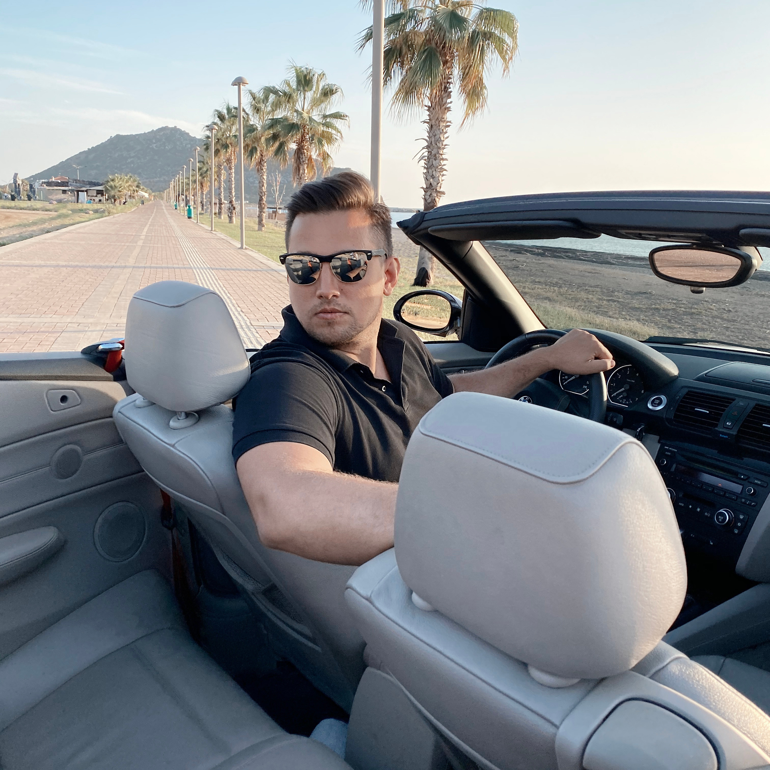 Filming for content with a cabriolet. Alsu Develi, Photographer in Turkey, Alanya, Side, Belek, Antalya, Kemer, Turkiye. Photoshooting in Alanya. Photosession in Belek, Side