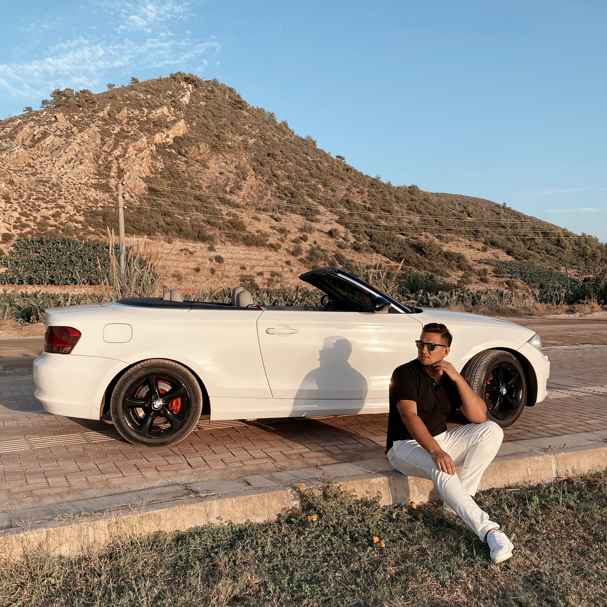 Filming for content with a cabriolet. Alsu Develi, Photographer in Turkey, Alanya, Side, Belek, Antalya, Kemer, Turkiye. Photoshooting in Alanya. Photosession in Belek, Side
