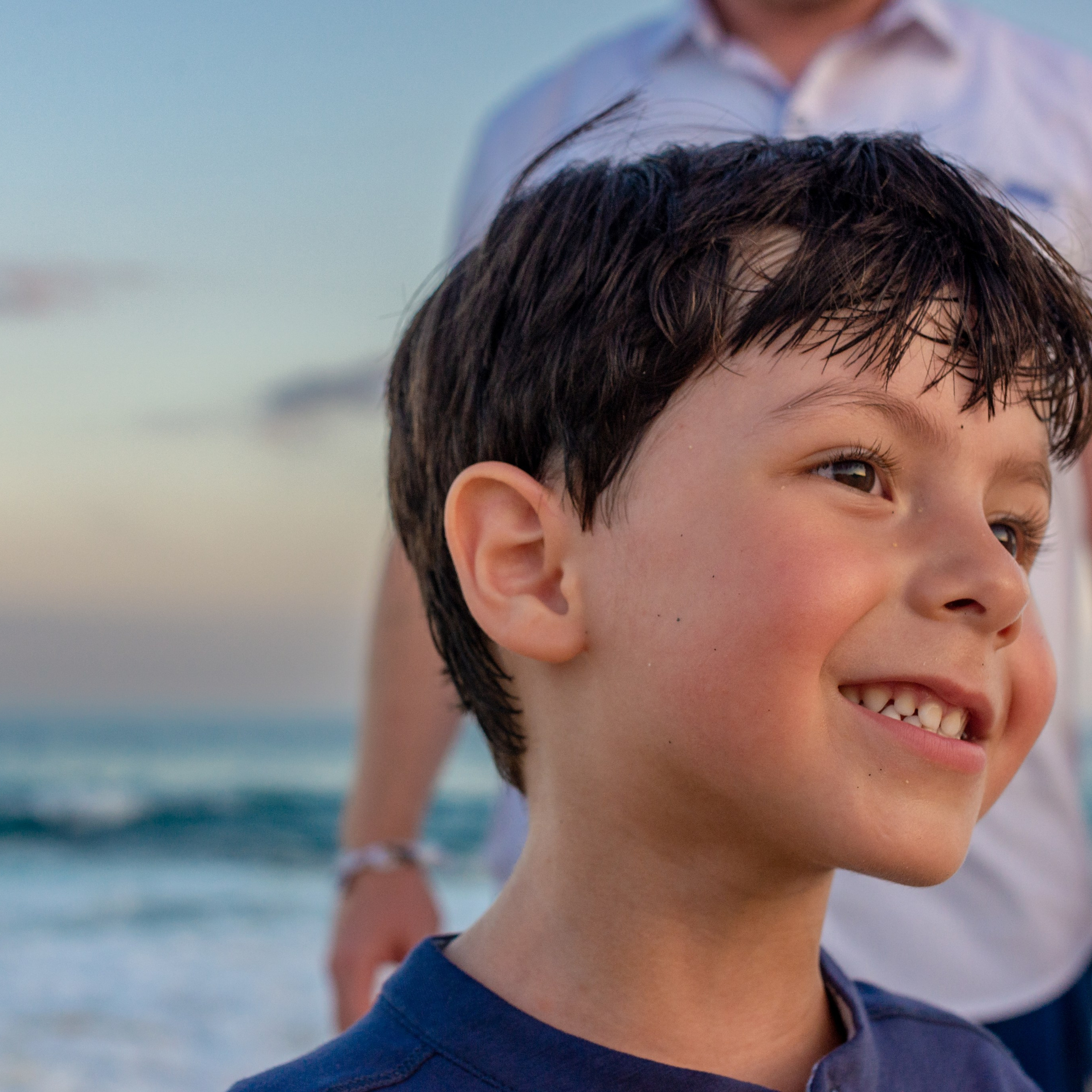 playing at the beach at los cabos, family photoshoot