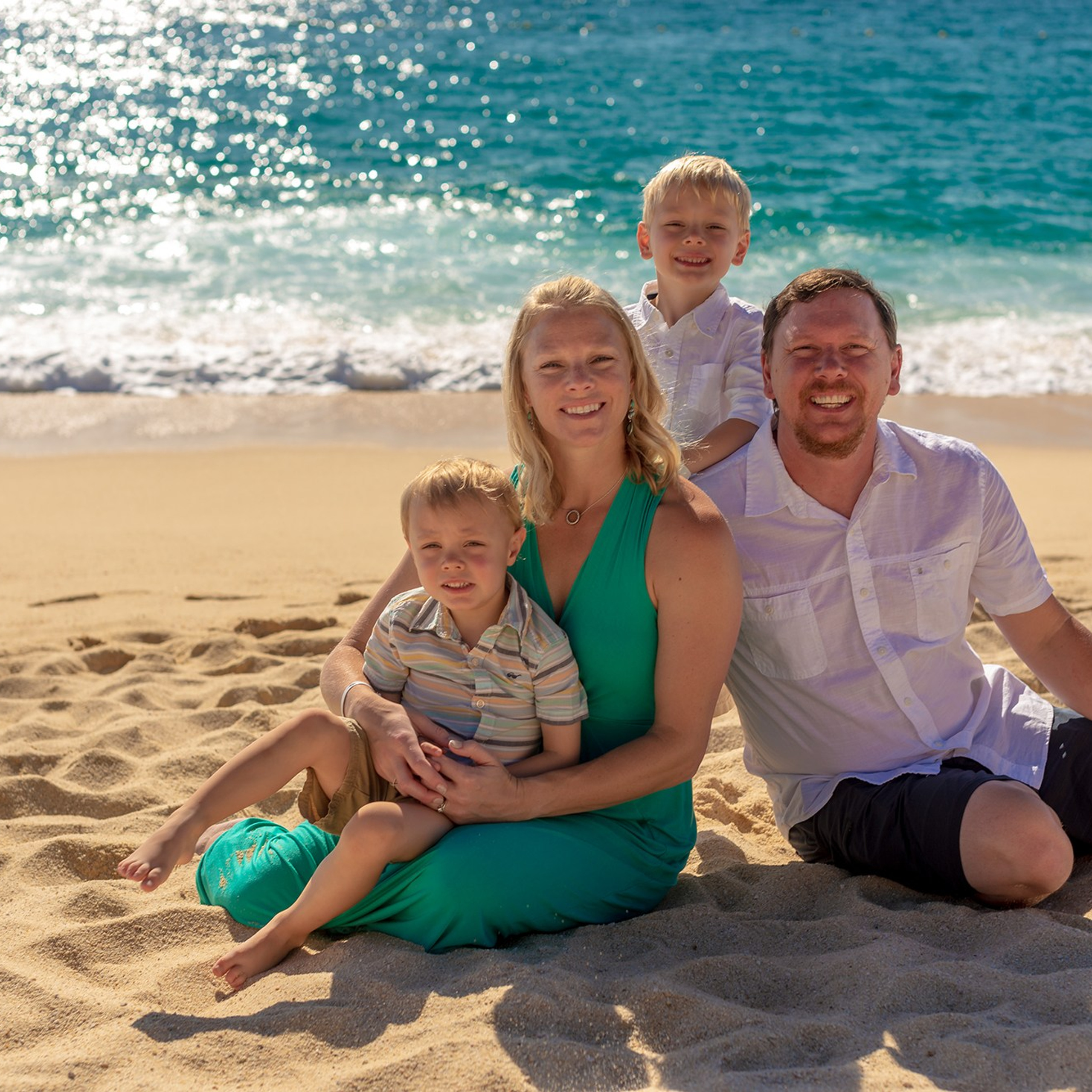 Family with two young kids on Los Cabos beach