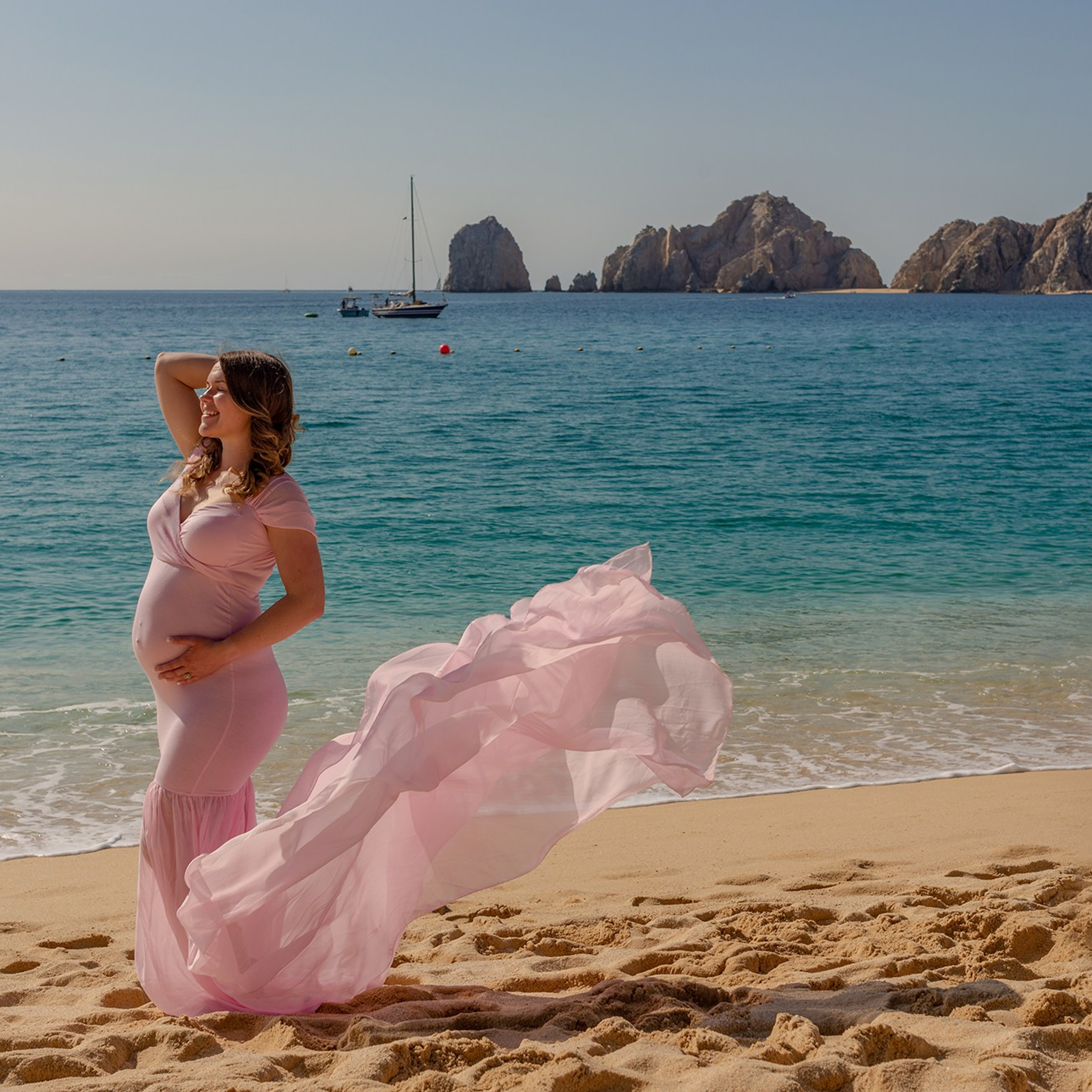 Maternity session in Los Cabos – profile portrait of expecting mother highlighting baby bump, photographed by destination maternity photographer in Baja California Sur